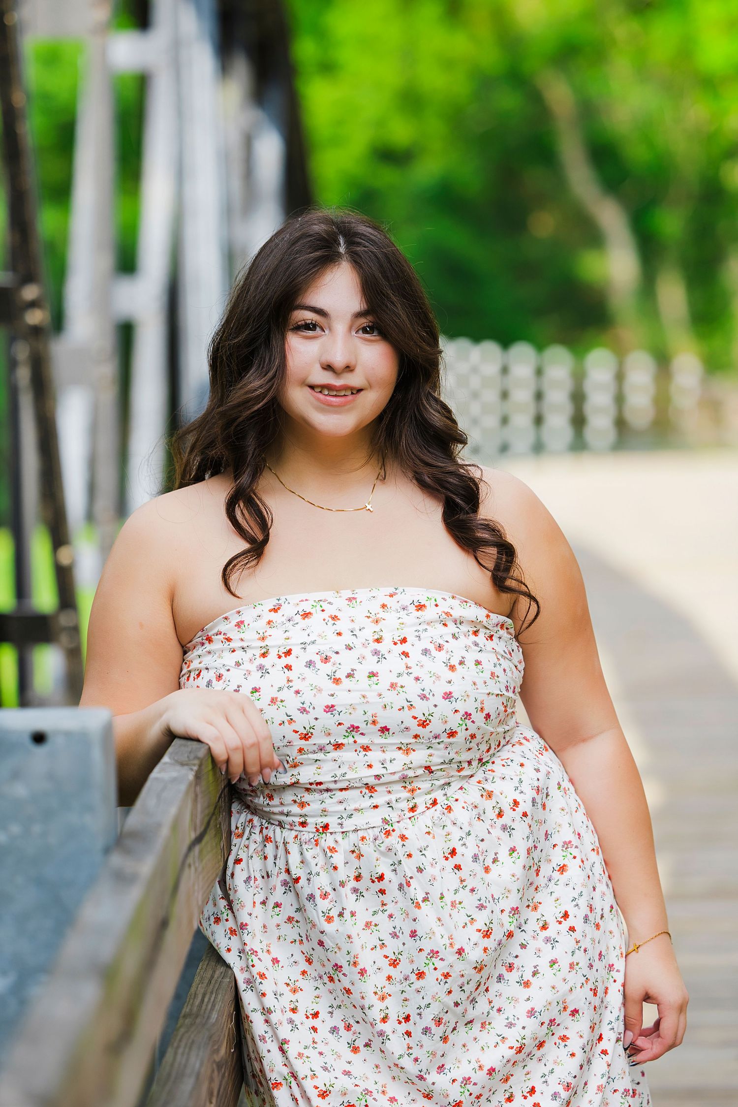 Senior graduation photos in Houston area with warm sunset tones and natural posing