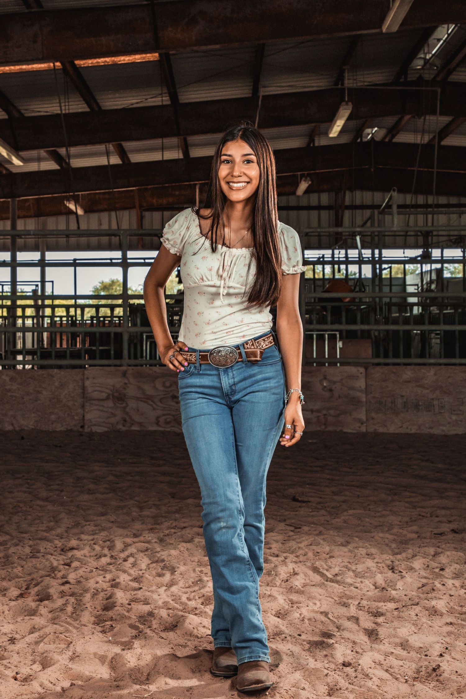 FFA girl posing in the barn