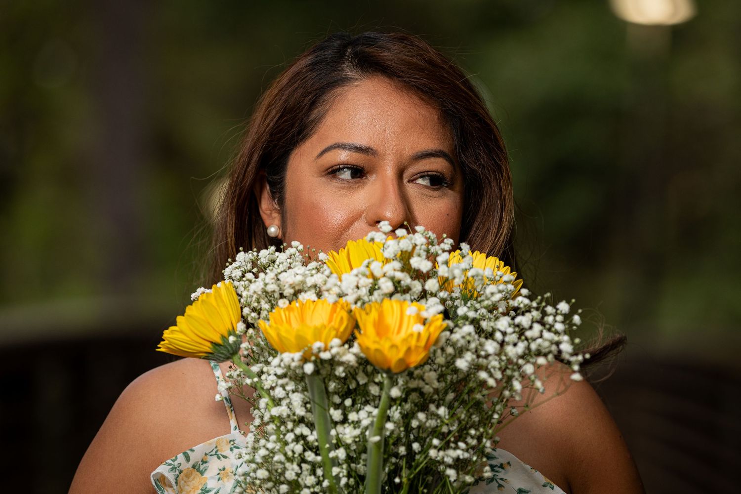 Birthday girl posing with flowers