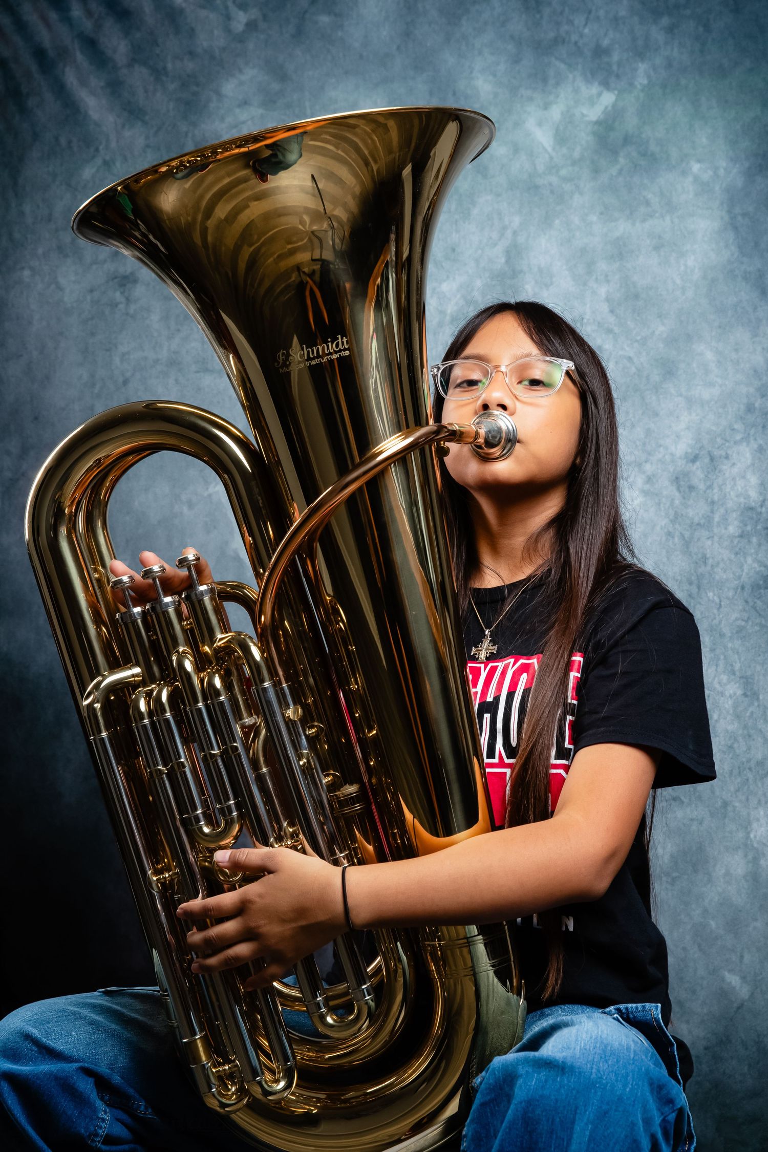 Middle school Orchestra student posing