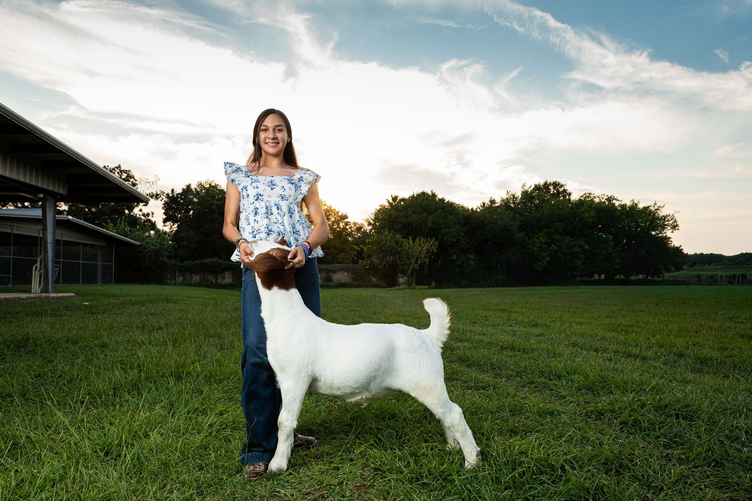 FFA student posing with animal