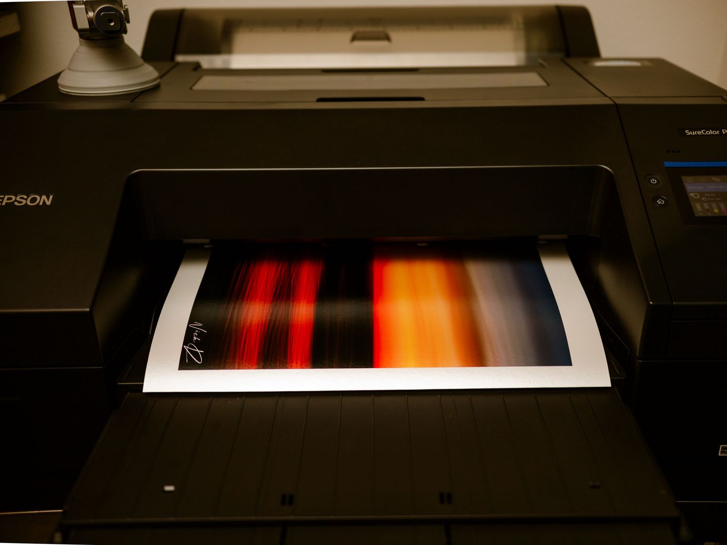 Epson professional printer outputting a vivid abstract landscape fine art photograph.