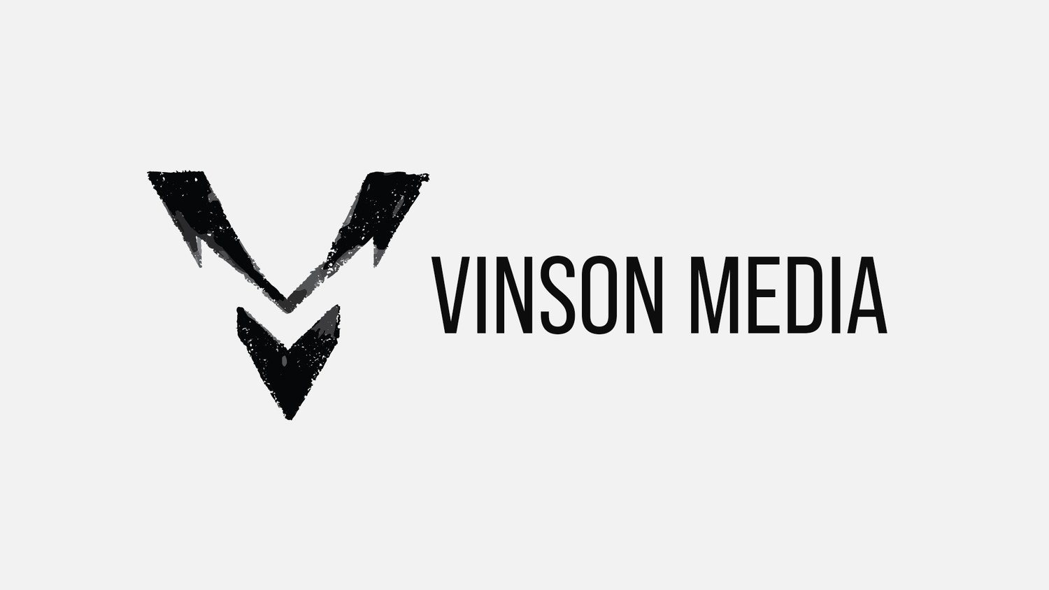 Vinson Media logo featuring a bold black chevron V symbol on a light gray background with company name in sans-serif font.