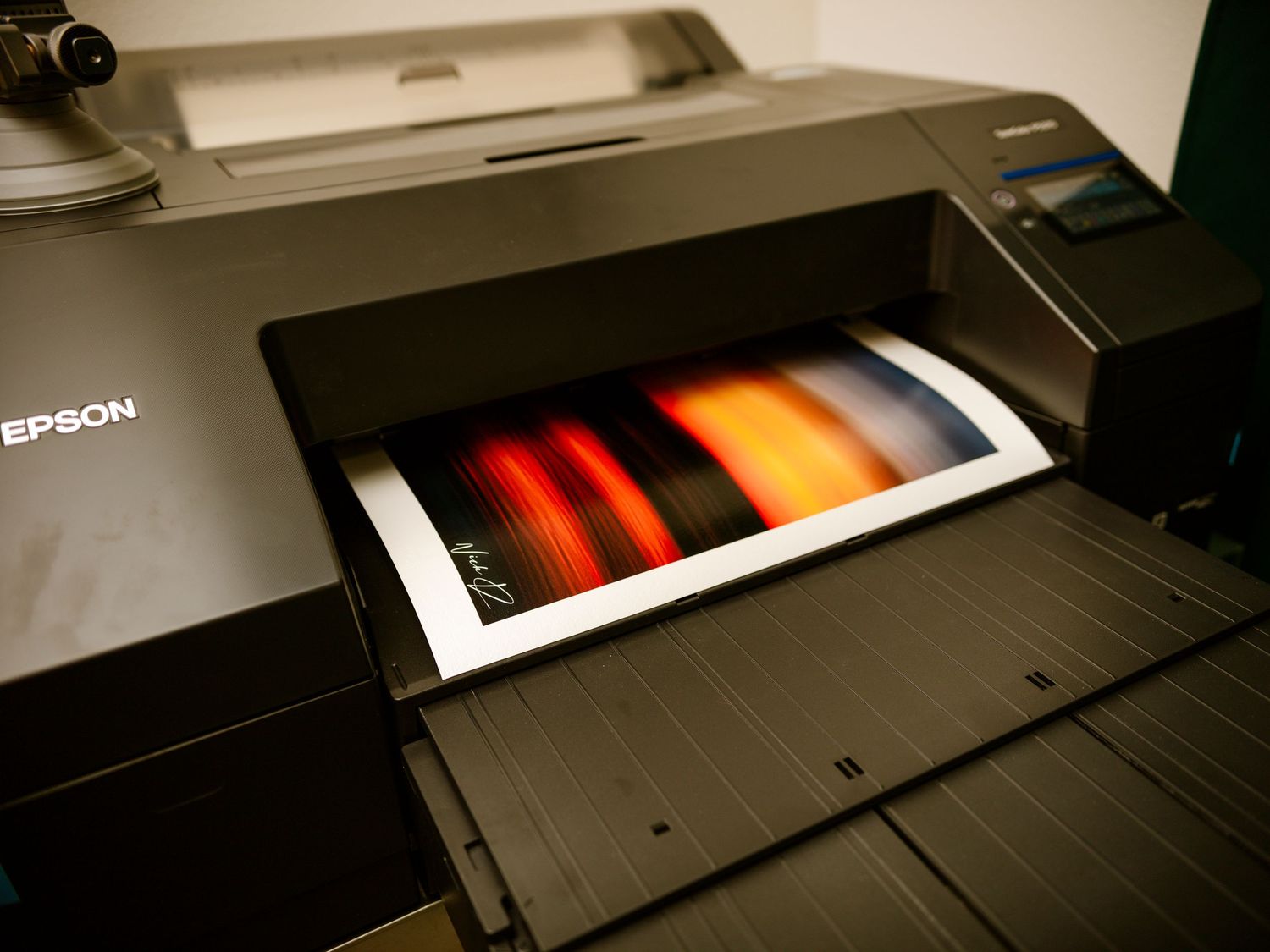 Epson large format printer producing a vibrant abstract sunset fine art print.