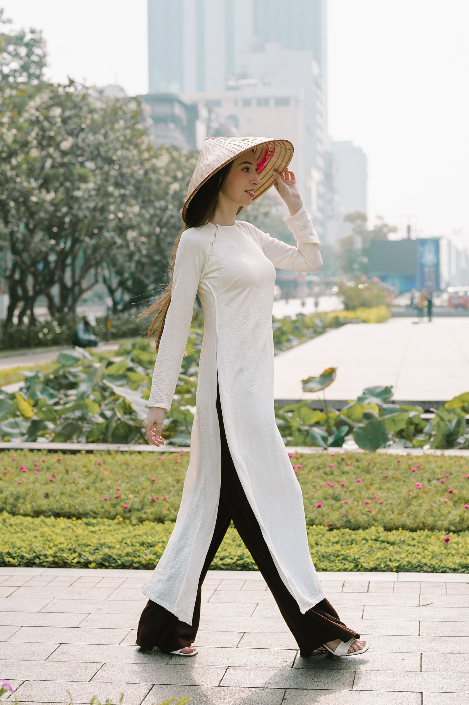 Fashion Photography in Ho Chi Minh City: Vietnamese Ao Dai on a model by Anastasia Sokyrka Portrait Photographer Saigon