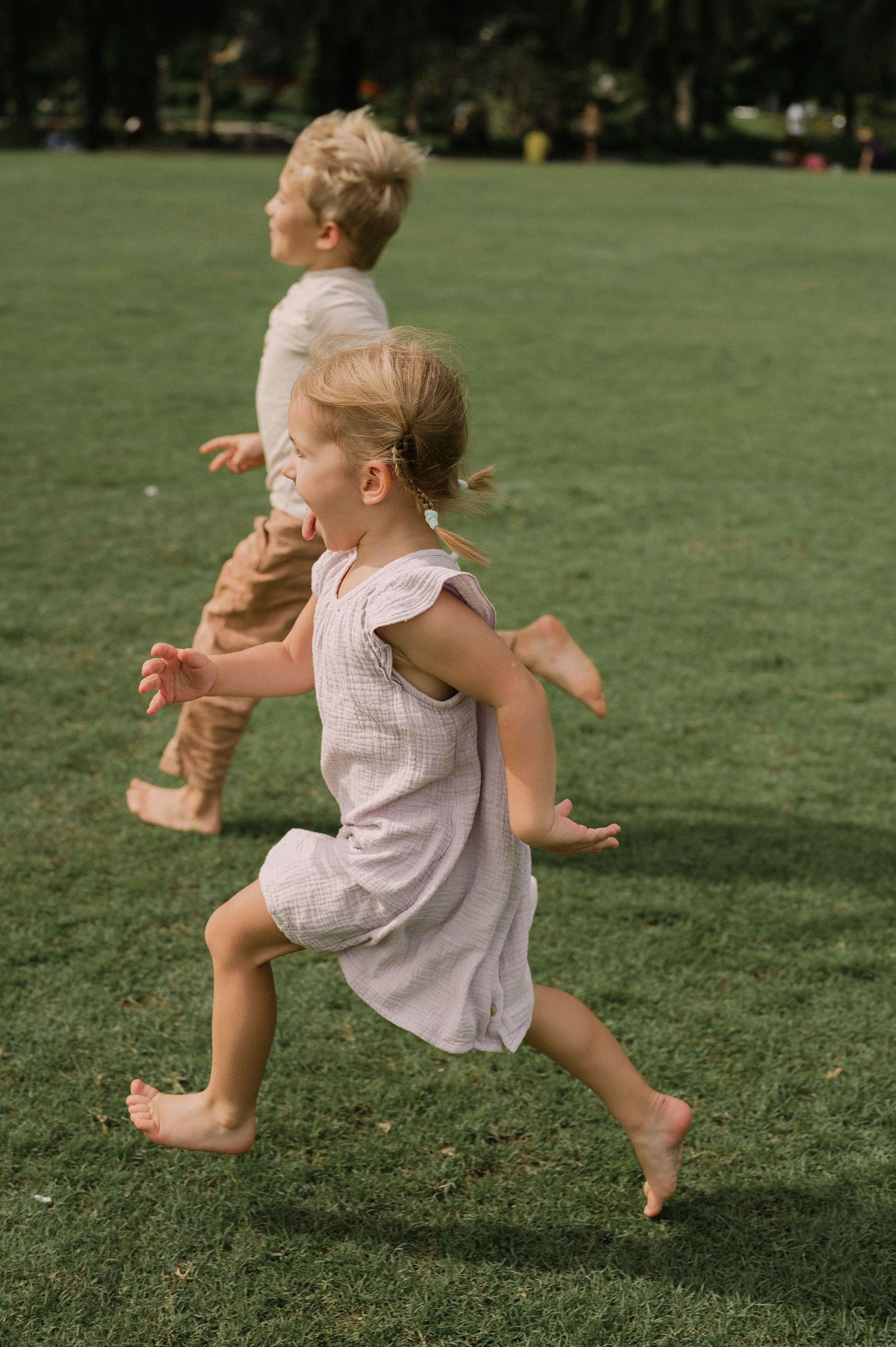 Lifestyle, candid family photography in park by Anastasia Sokyrka | Portrait photographer based in Saigon, Vietnam
