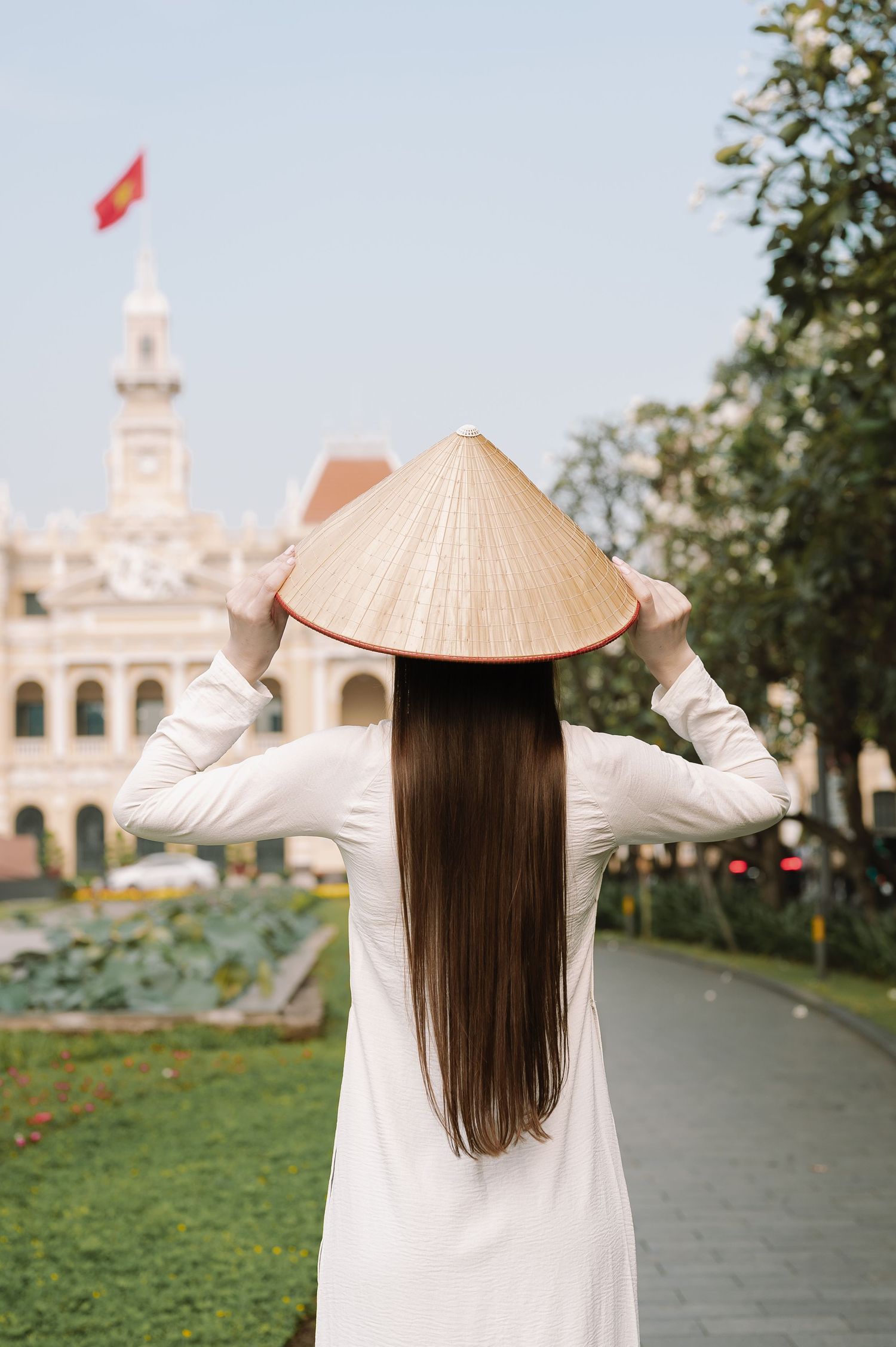 Fashion Photography in Ho Chi Minh City: Vietnamese Ao Dai on a model by Anastasia Sokyrka Portrait Photographer Saigon