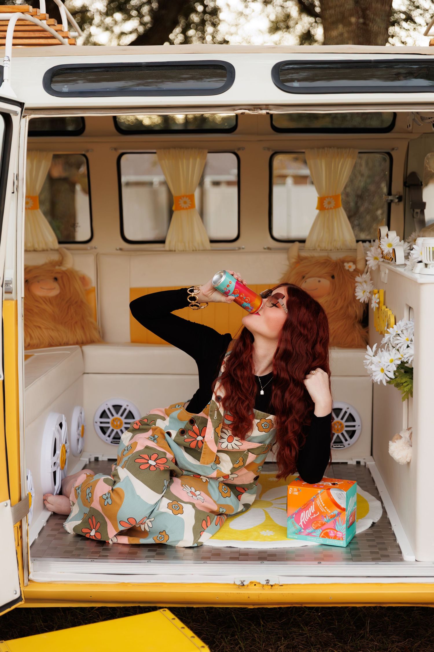 A series of photos showing someone lying down reading books in a vintage Volkswagen van with yellow curtains.