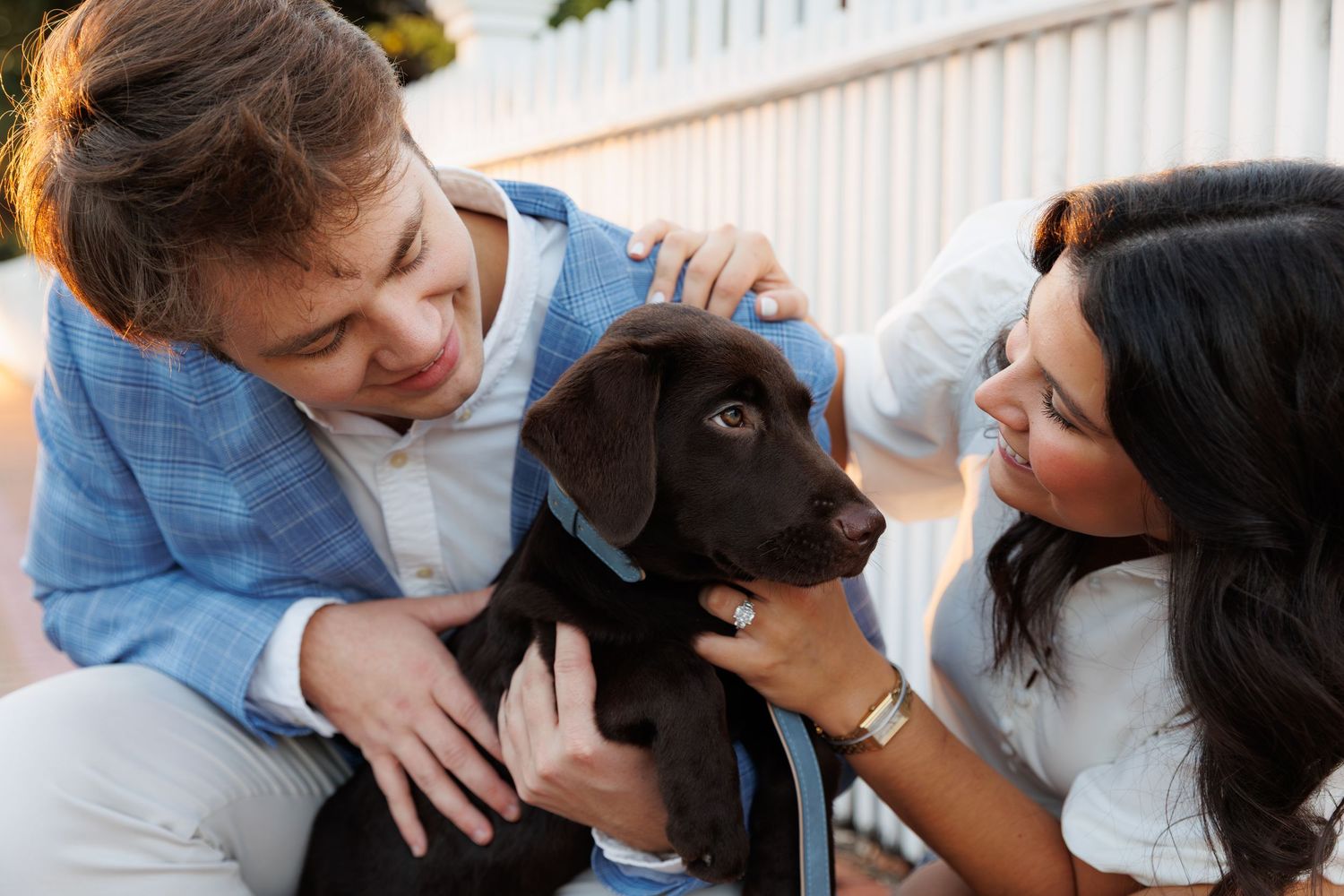 A series of four romantic photos showing a couple embracing and sharing tender moments together outdoors.