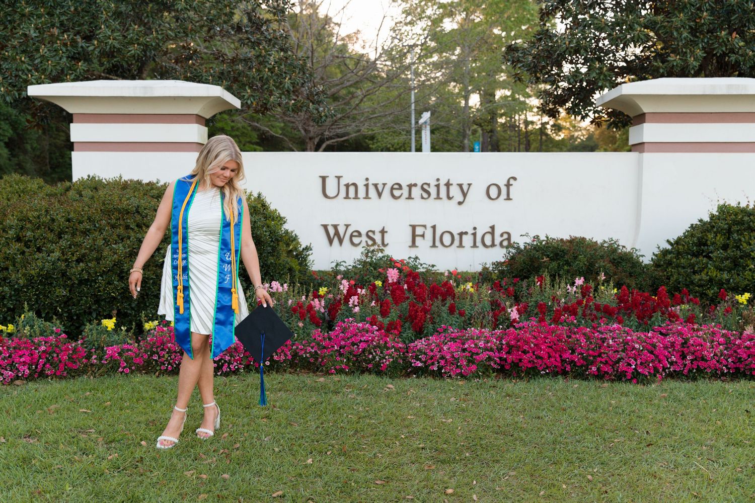 A series of photos showing a student posing in front of a University of West Florida sign and pink flowers.