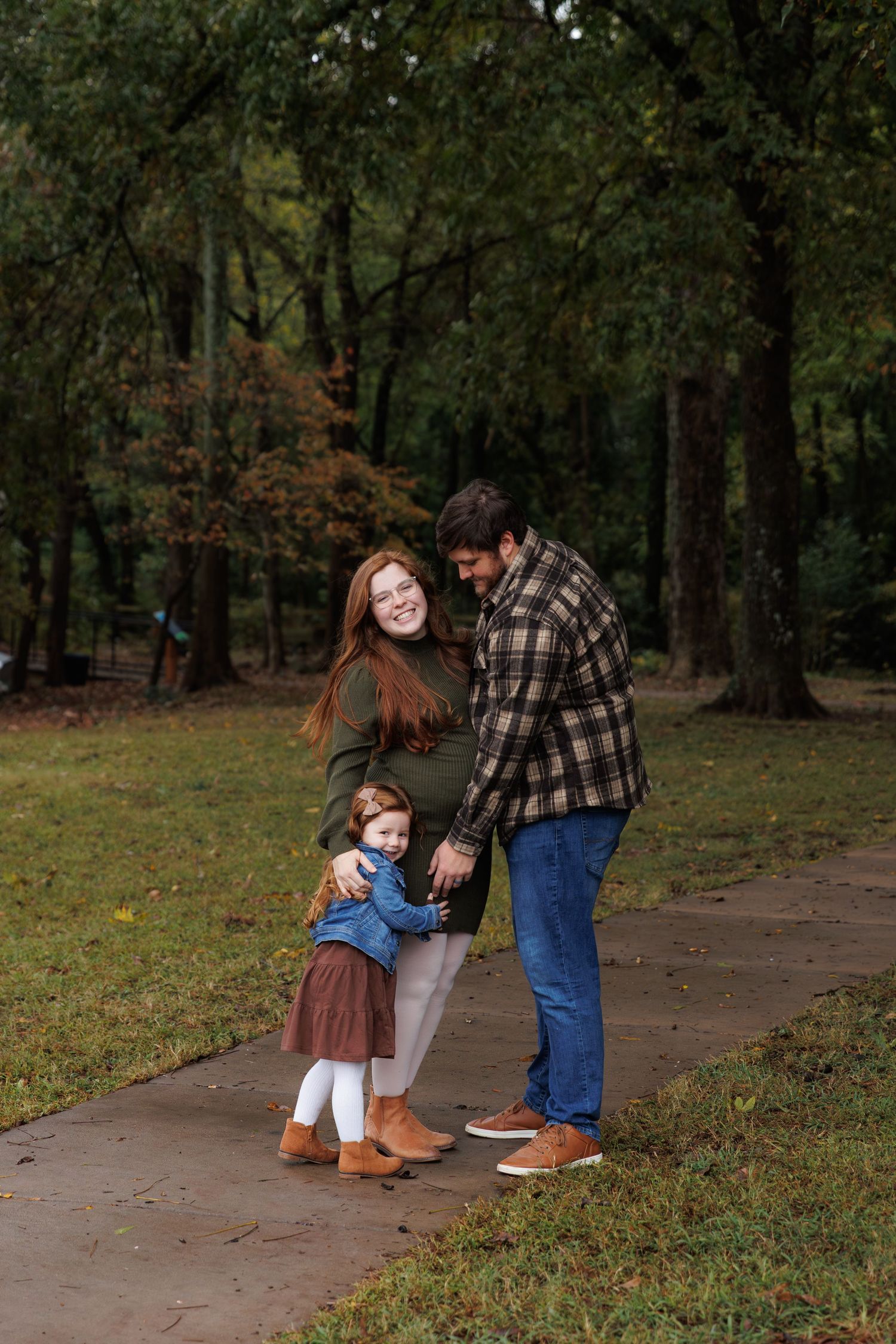 Heartwarming family moments unfold in sequence along a tree-lined path during fall.