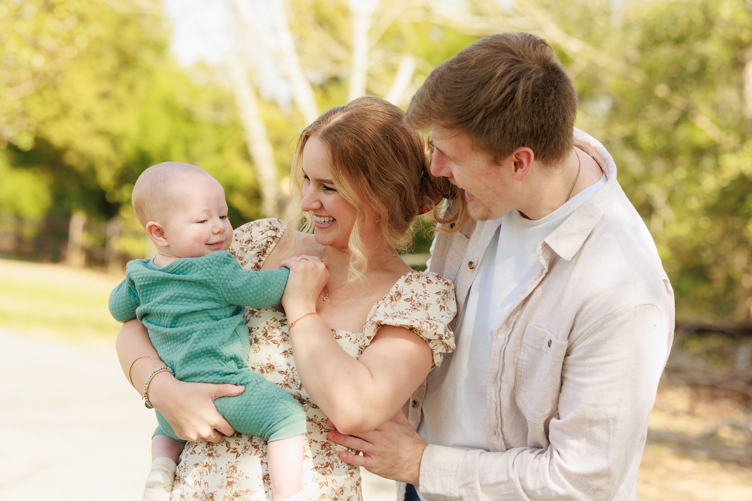 A series of candid family photos showing joyful interactions in a natural outdoor setting.