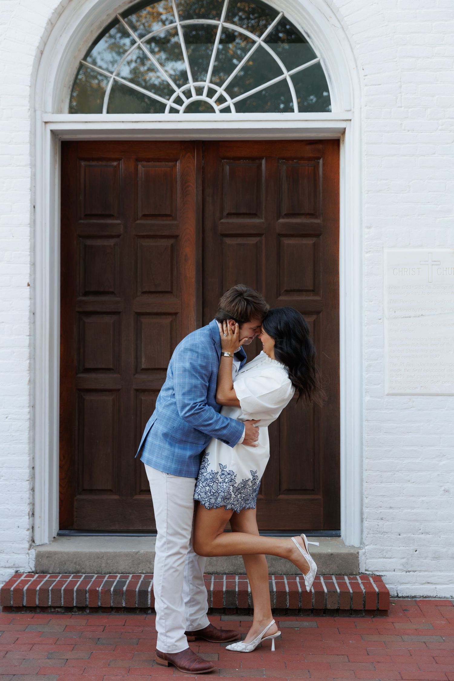 Four sequential photos show a romantic dip pose in front of white church doors with dark wood panels and brick steps.