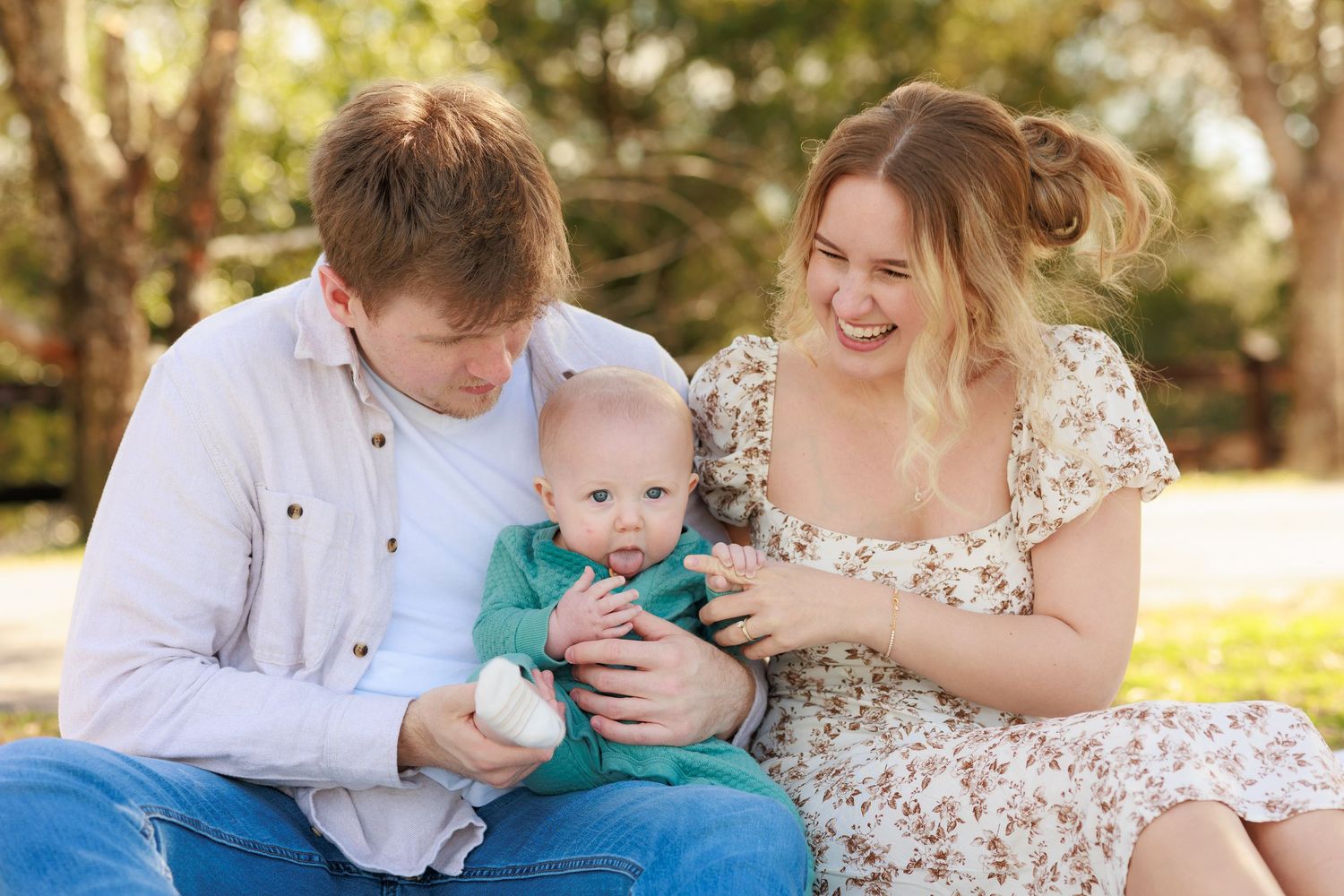 A tender family moment captured in a series of candid outdoor photos with warm sunlit tones.