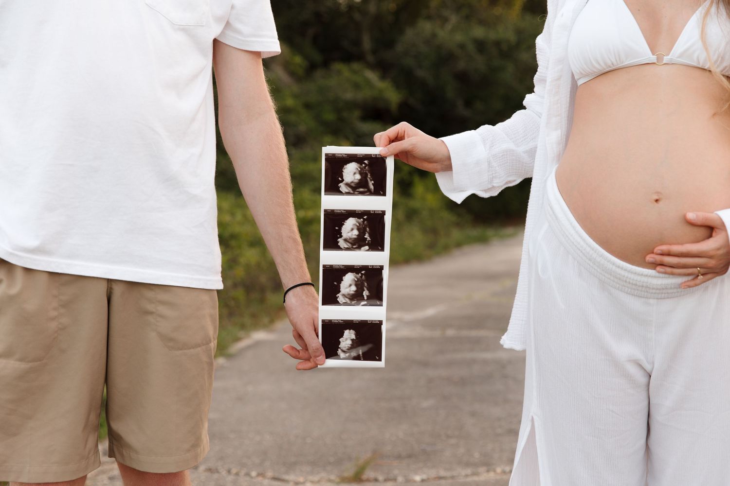 A series of pregnancy announcement photos showing ultrasound images and a growing baby bump in white and khaki outfits.