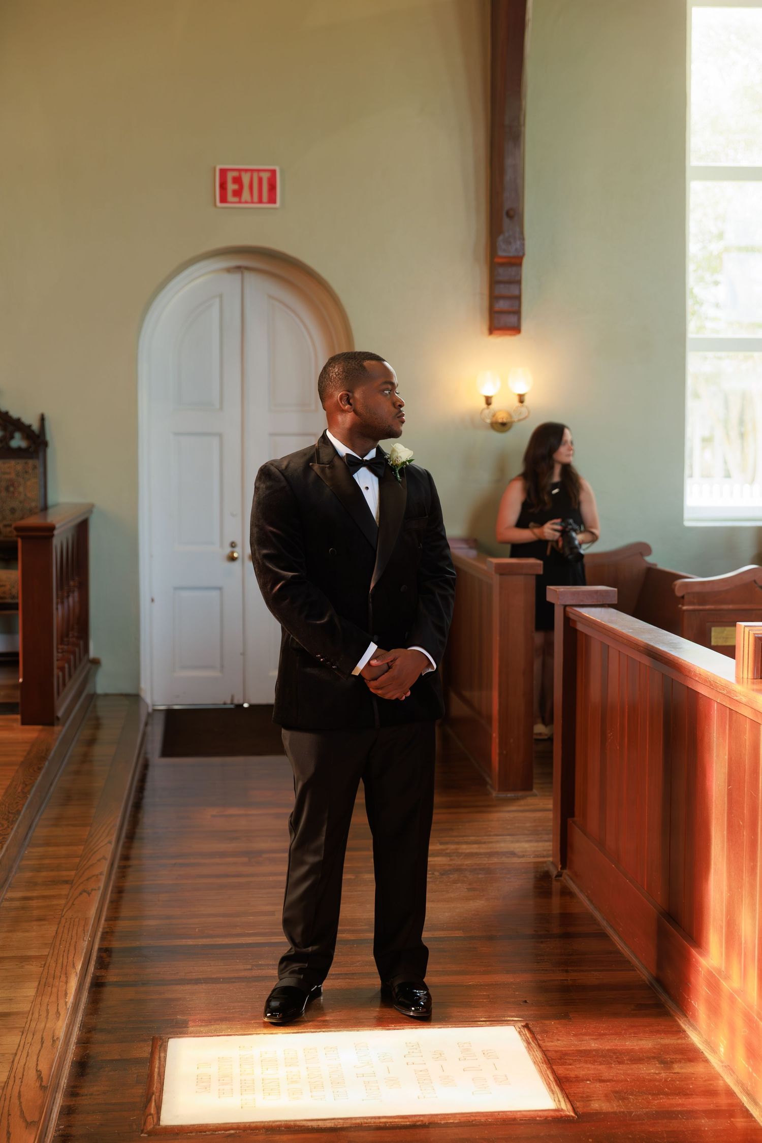 A series of photos showing a groomsman waiting in a church hallway with wooden pews and natural lighting.