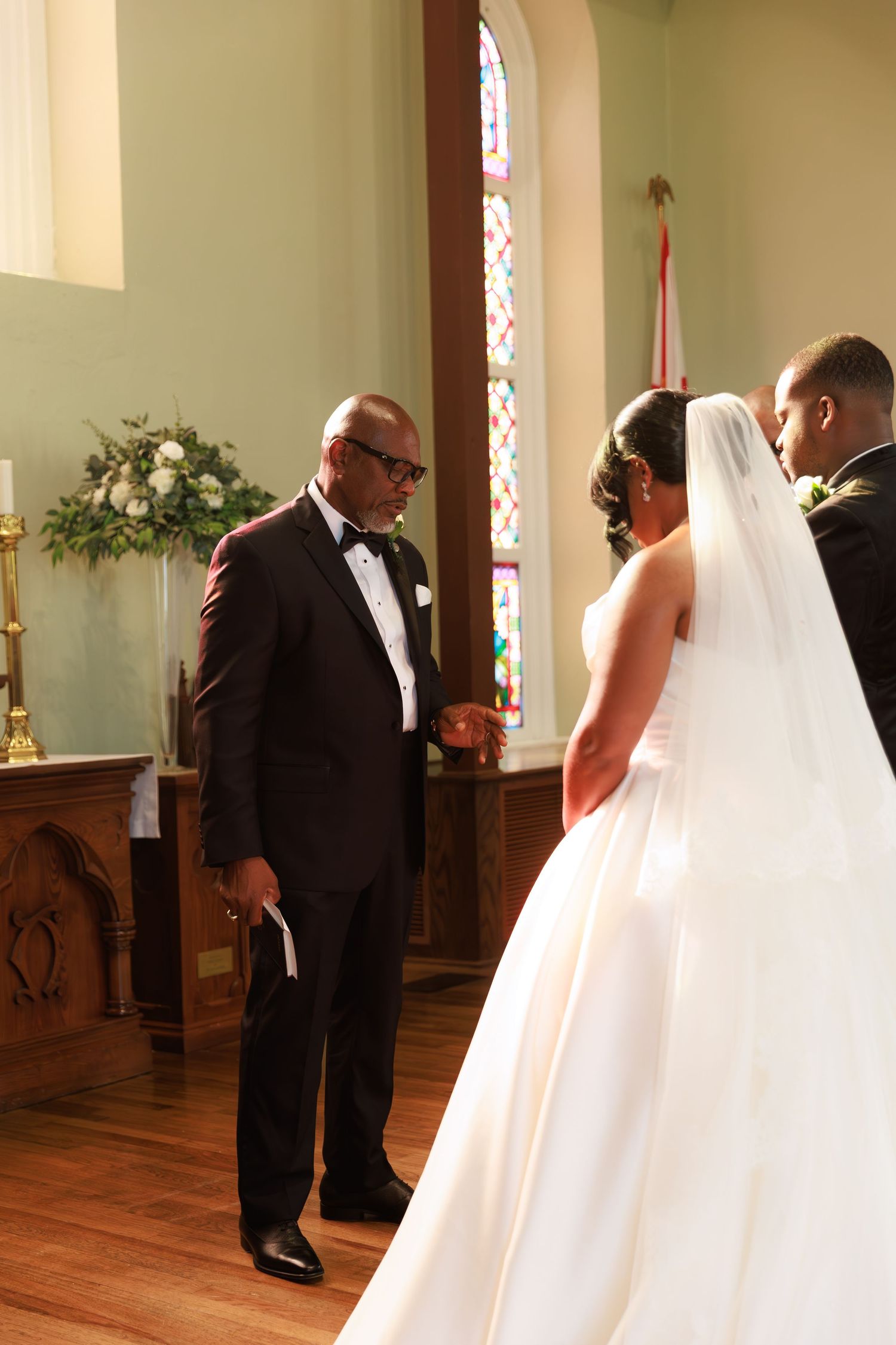 A wedding ceremony sequence shows a couple at the altar in a church with stained glass windows and wooden floors.