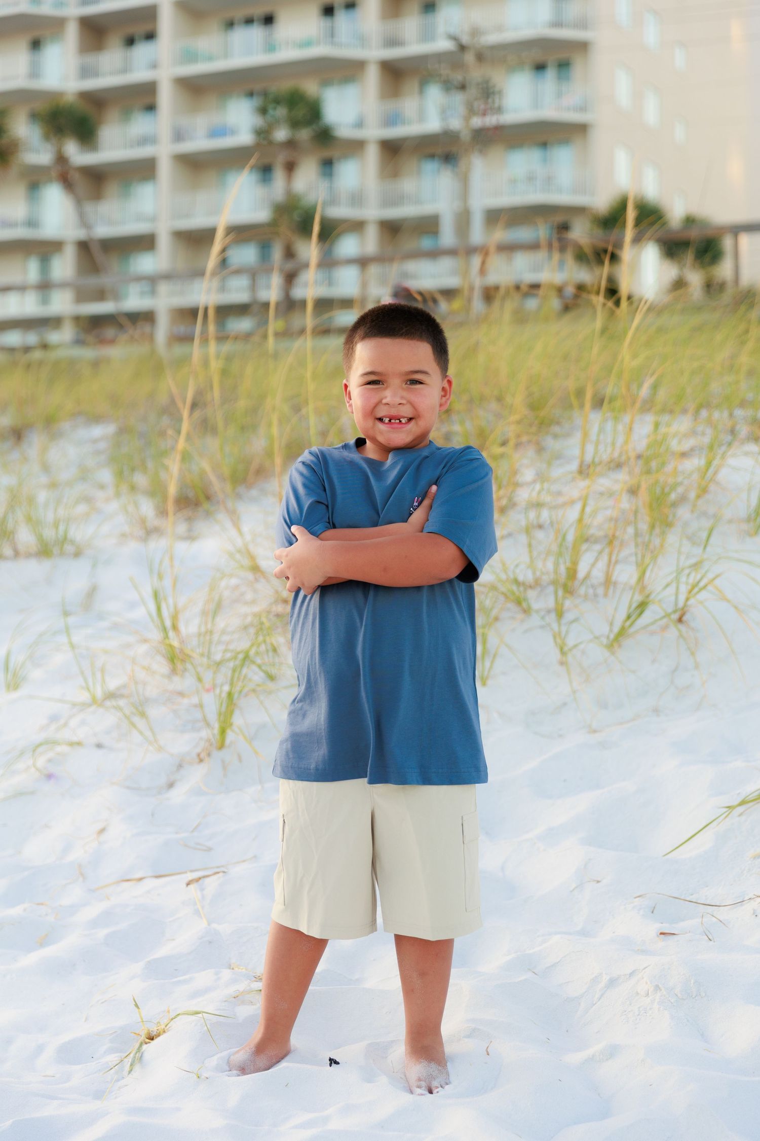 Multiple candid shots showing joyful expressions against a beachfront backdrop with sea oats and sand.