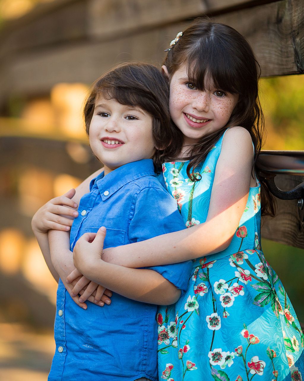 A sequence of photos showing siblings hugging and bonding in a candid outdoor setting.