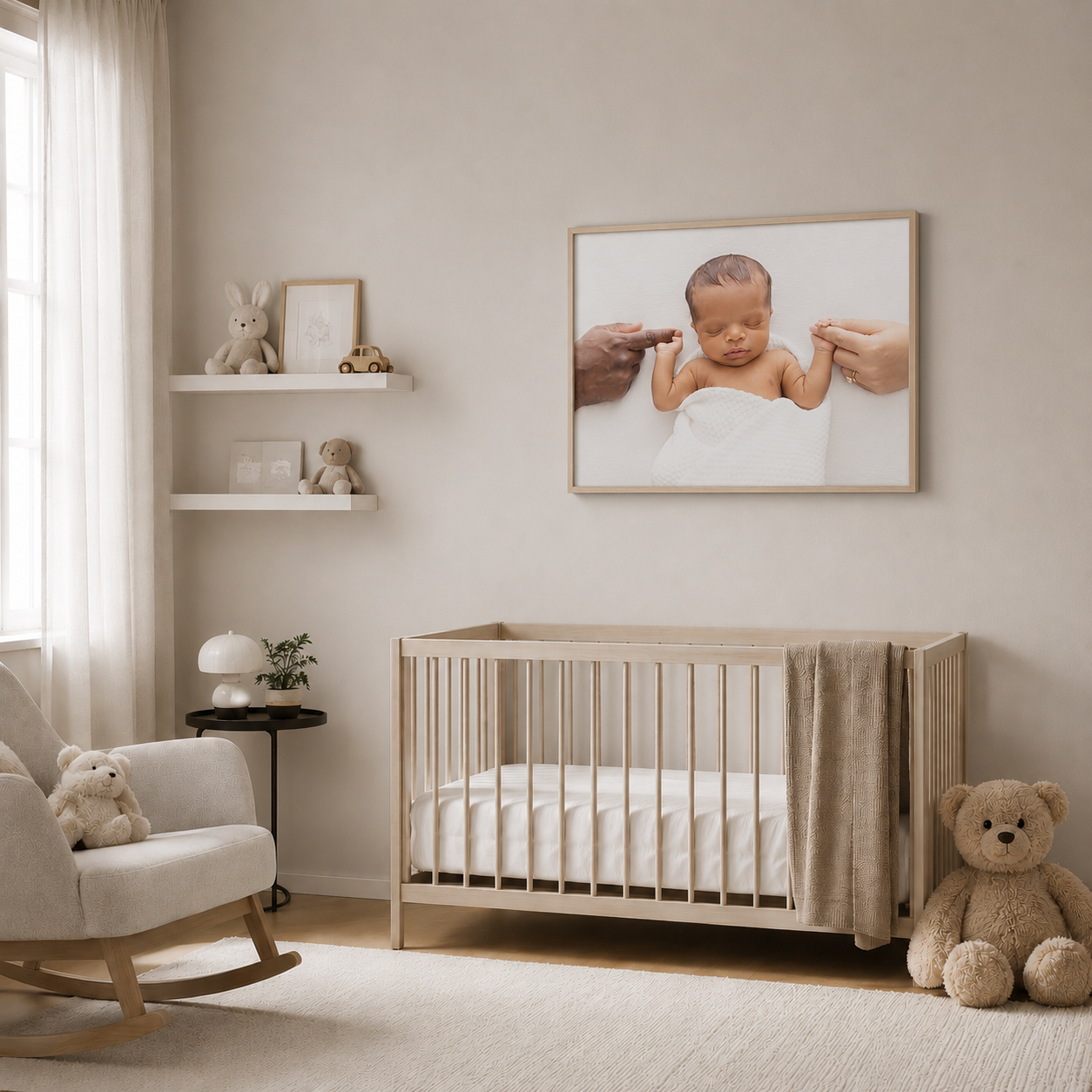Serene neutral nursery with wooden crib, rocking chair, teddy bear, and newborn baby photo above floating shelves.