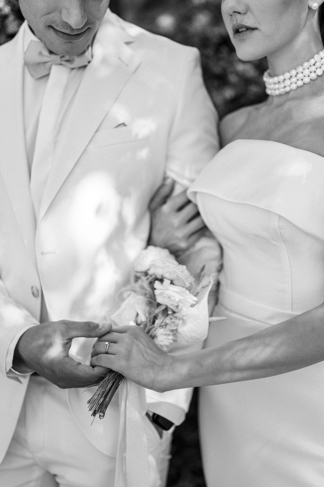 Couple touching – A close-up of a couple touching faces and kissing intimately.