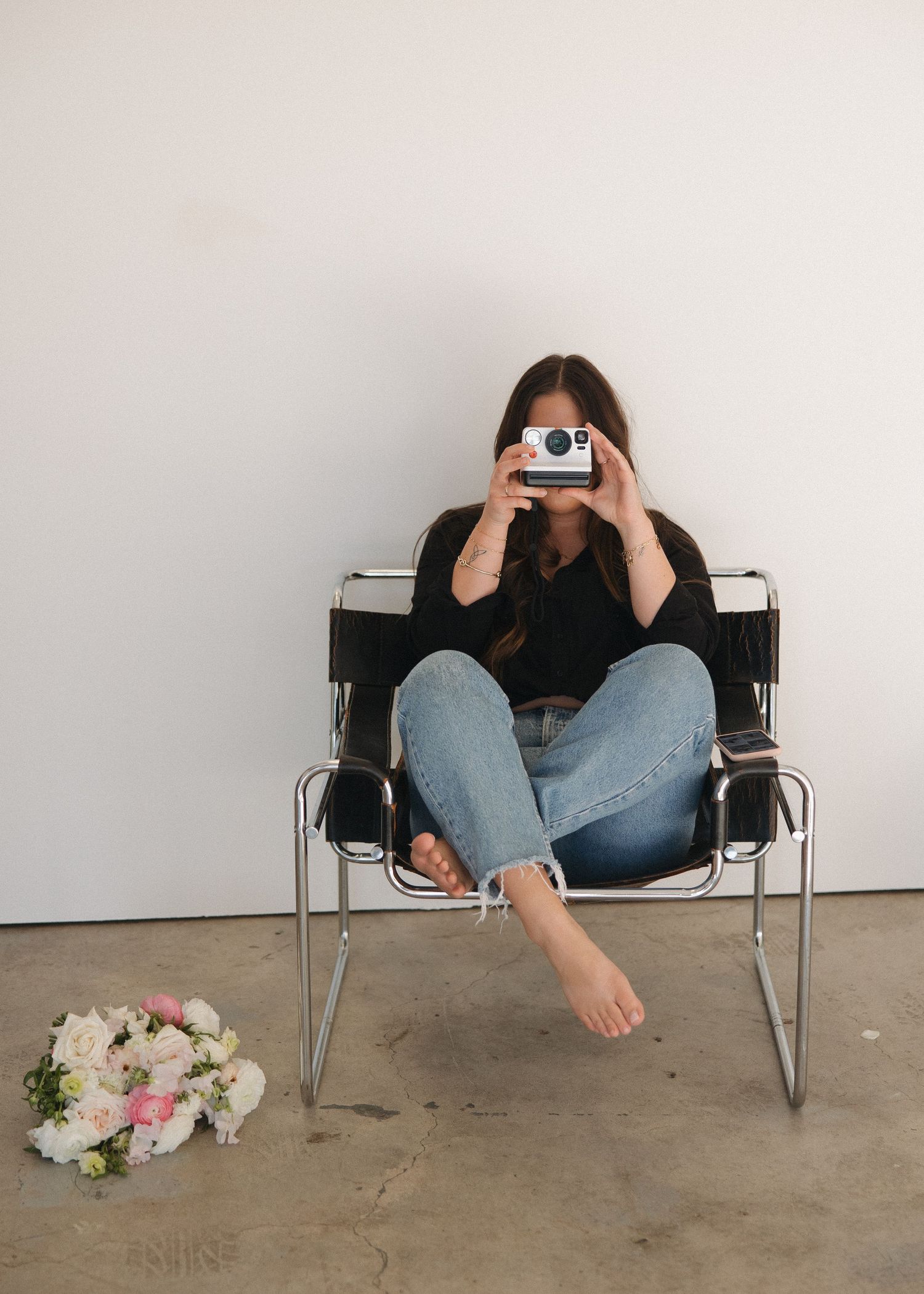 photographer holding camera during brand shoot