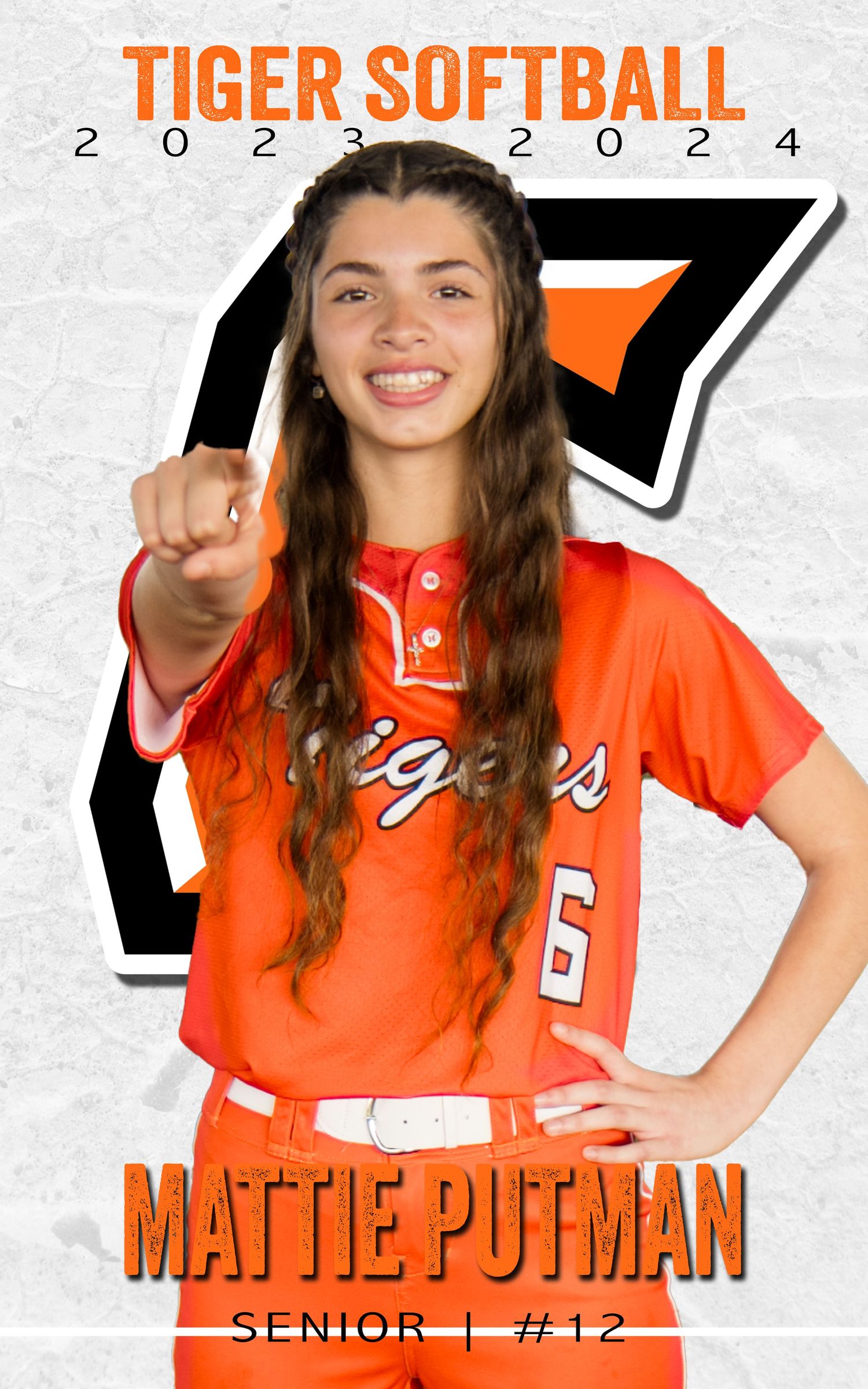 A softball player in an orange Tigers jersey with the number 12 poses for a team photo against a white background.