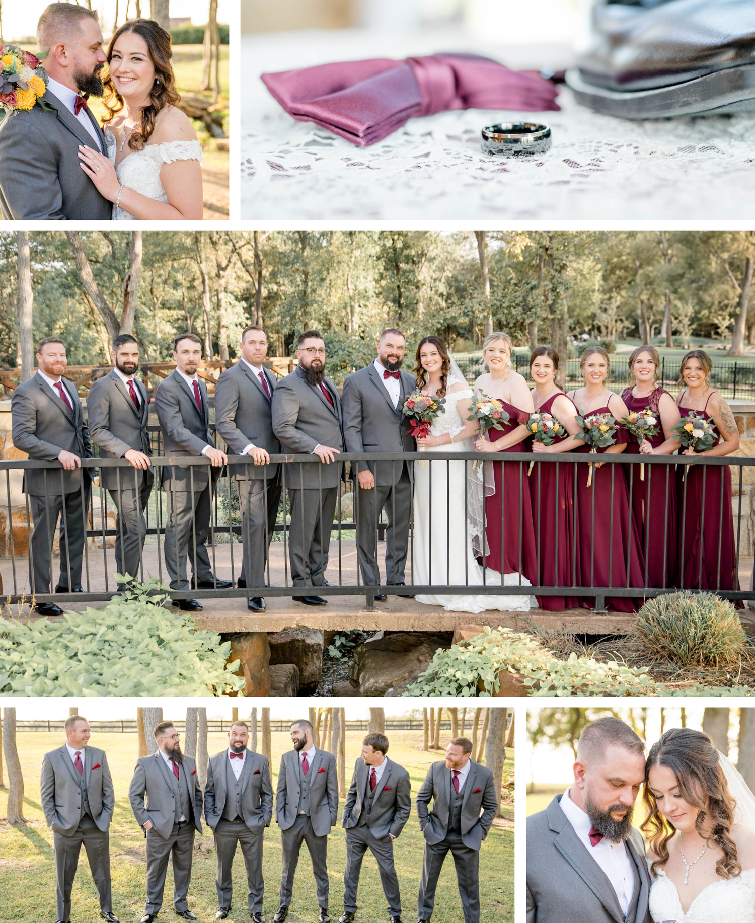 Wedding party in burgundy and charcoal attire pose with joyful expressions on a rustic bridge surrounded by trees.