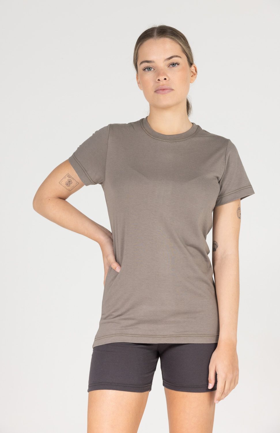 Grey athletic t-shirt and black shorts shown in multiple angles on light background.