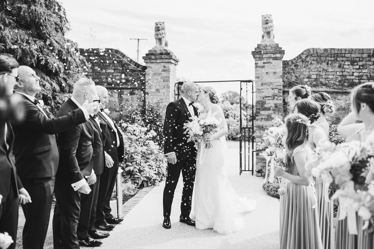 Beautiful wedding at Gaynes Park, Essex, featuring rustic barns, stunning gardens, and romantic outdoor photography in a picturesque setting