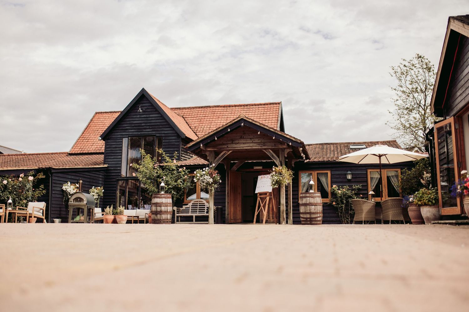 Maidens Barn blending rustic charm and luxury Rustic wedding venue in Essex countrysideSummer weddings at Maidens Barn Essex barn wedding