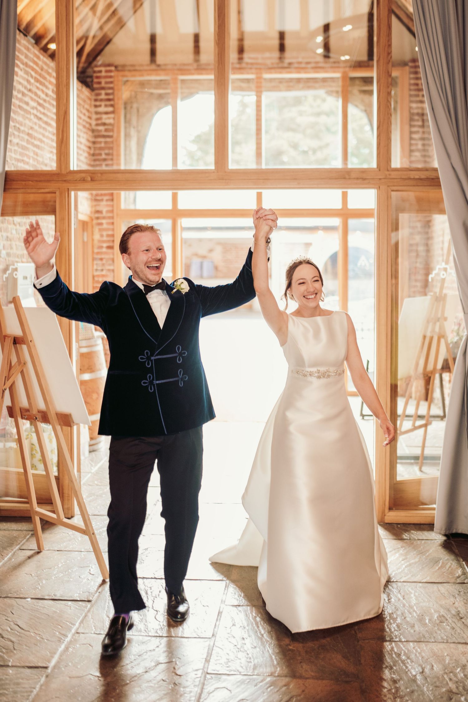 A sequence of wedding photos showing joyful moments and dance moves on a rustic brick and wood floor venue.