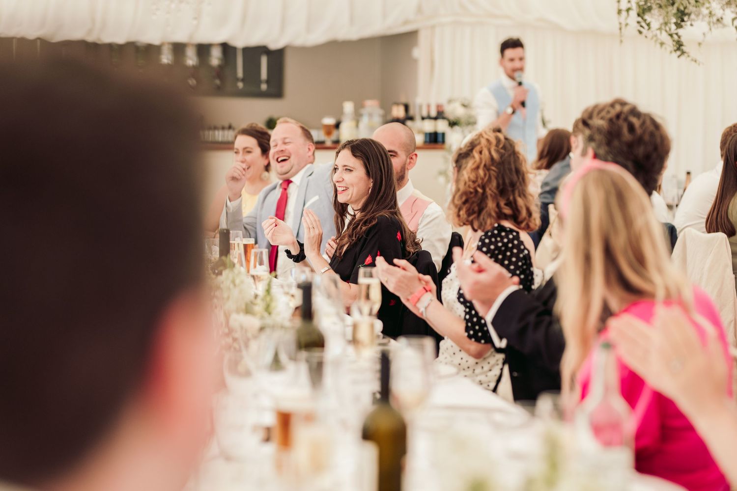 Glemham Hall Wedding Venue in Suffolk Countrysid Exchange Vows in Glemham Hall's Great HallTable Setup in Marquee with Pastel Flowers