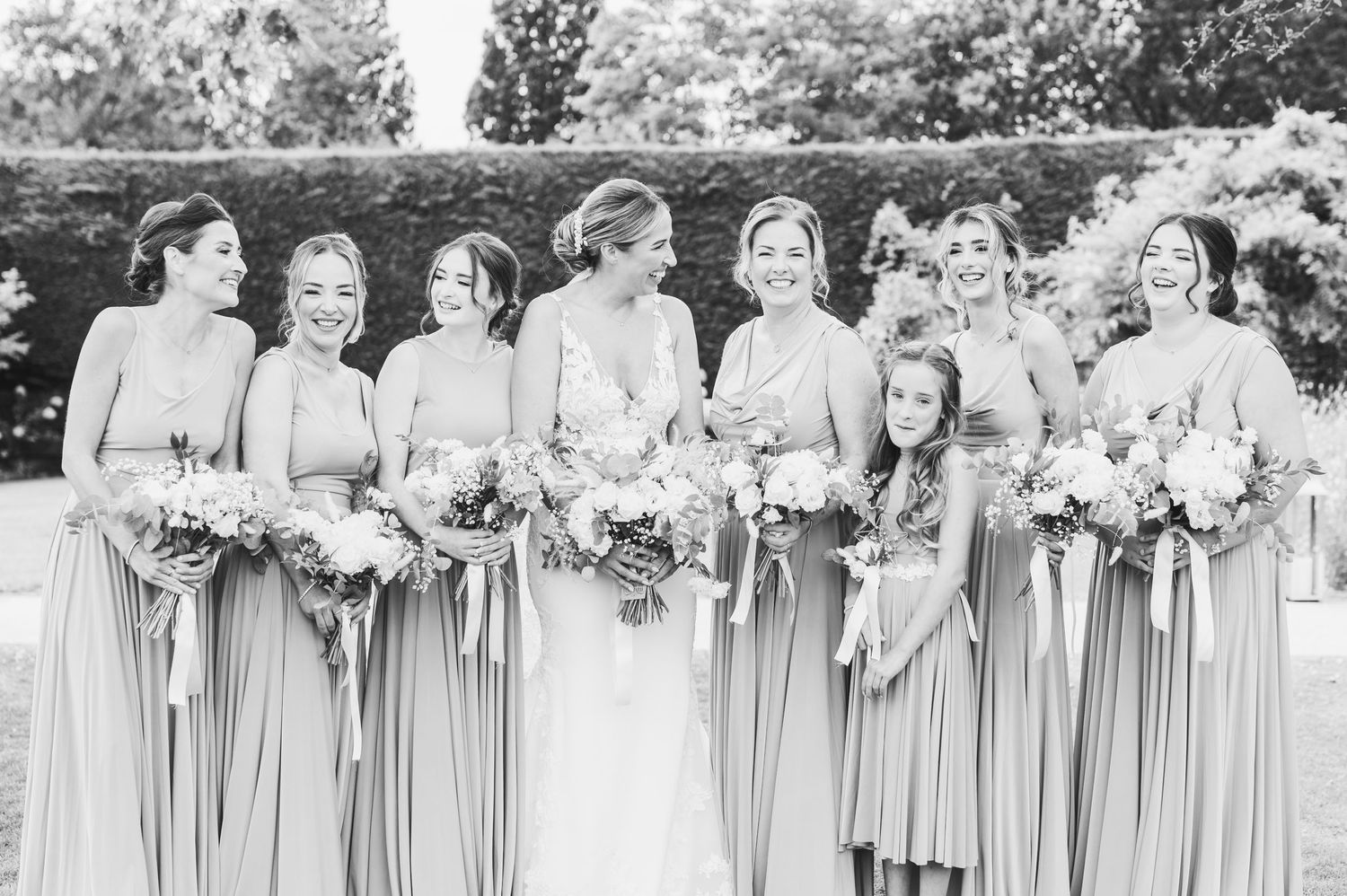 Beautiful wedding at Gaynes Park, Essex, featuring rustic barns, stunning gardens, and romantic outdoor photography in a picturesque setting