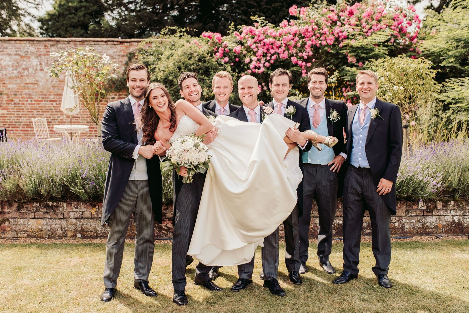 Glemham Hall Wedding Venue in Suffolk Countrysid Exchange Vows in Glemham Hall's Great HallTable Setup in Marquee with Pastel Flowers