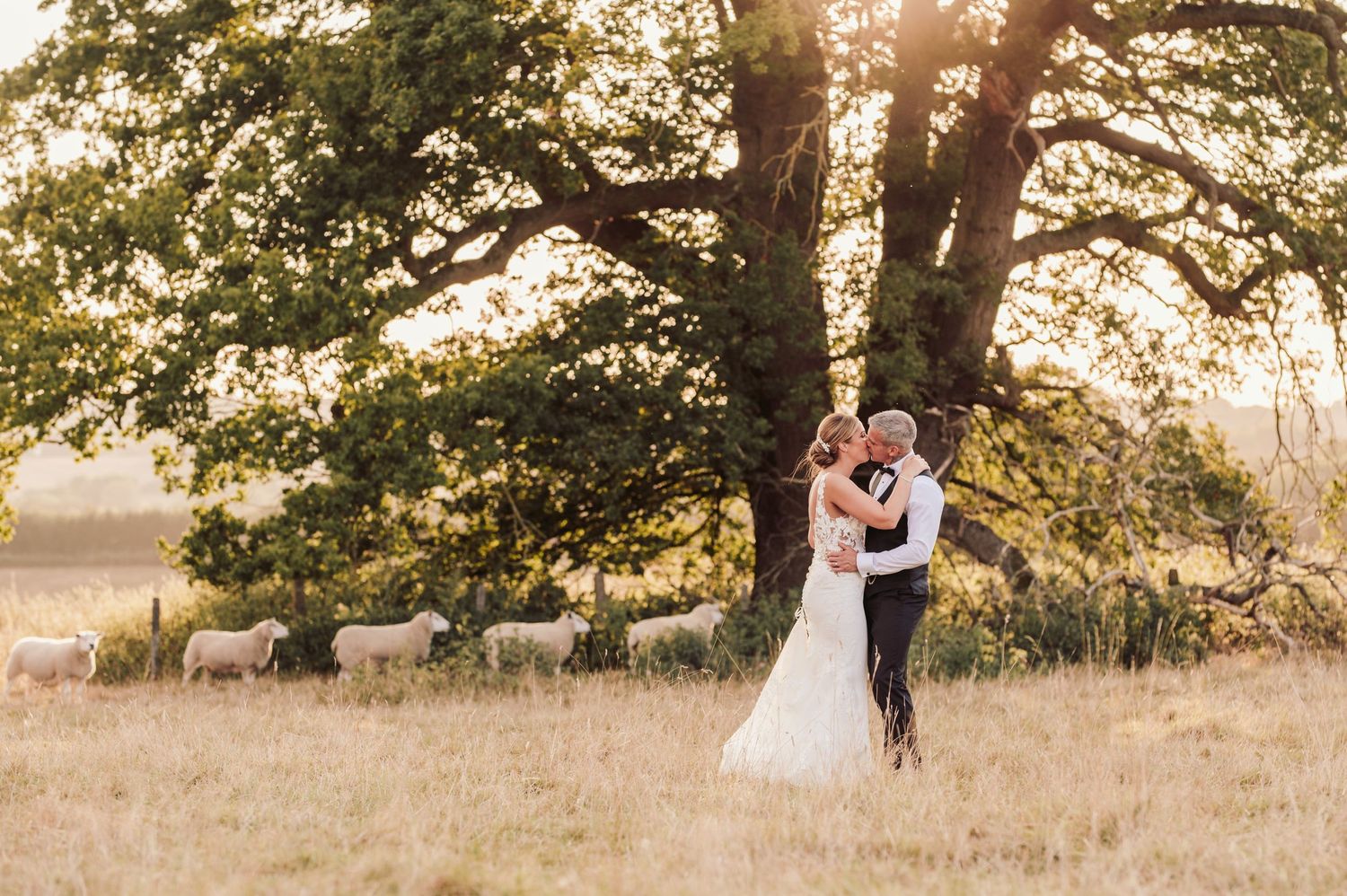 Beautiful wedding at Gaynes Park, Essex, featuring rustic barns, stunning gardens, and romantic outdoor photography in a picturesque setting