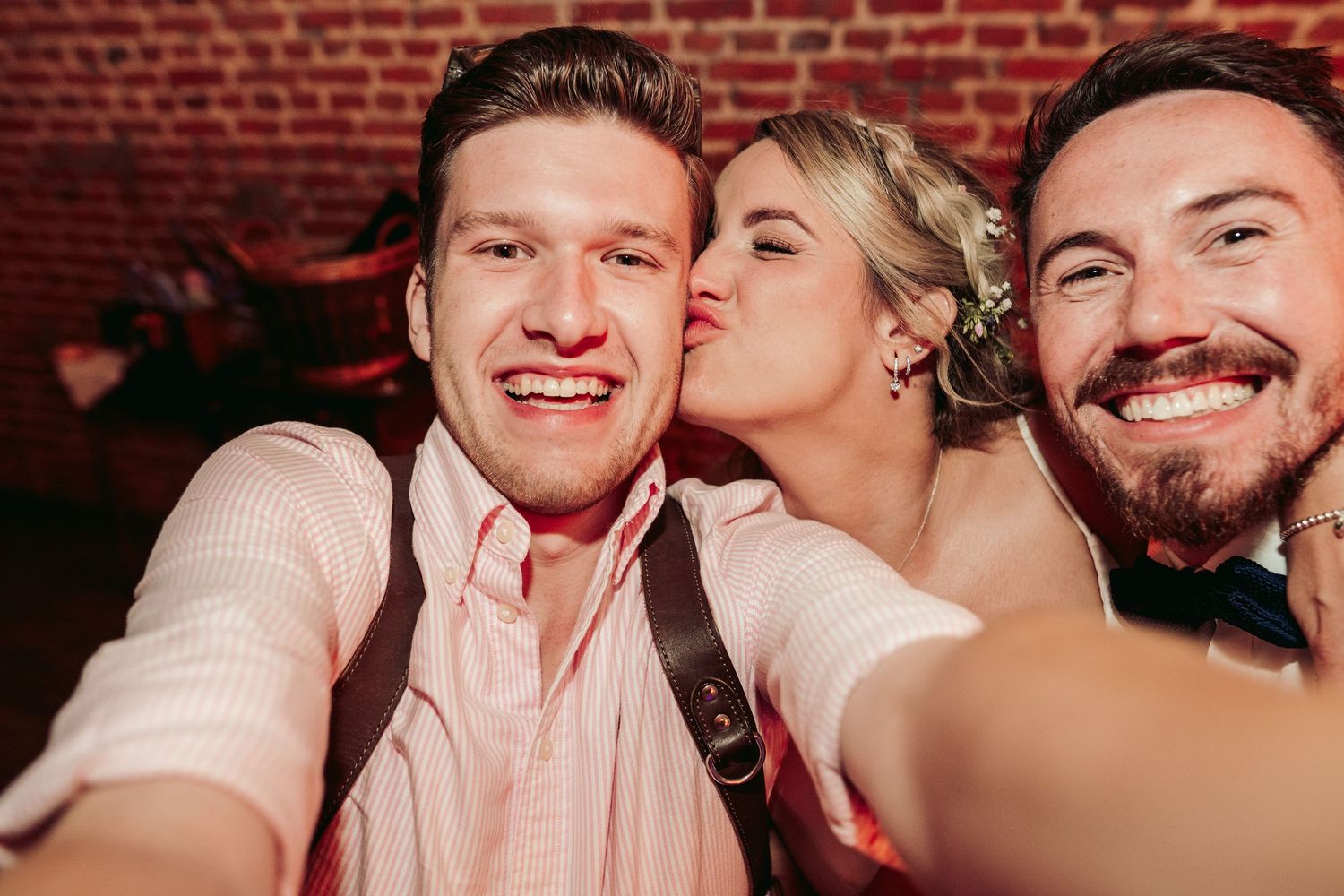 Warm-toned candid reception photos showing joyful celebration moments.