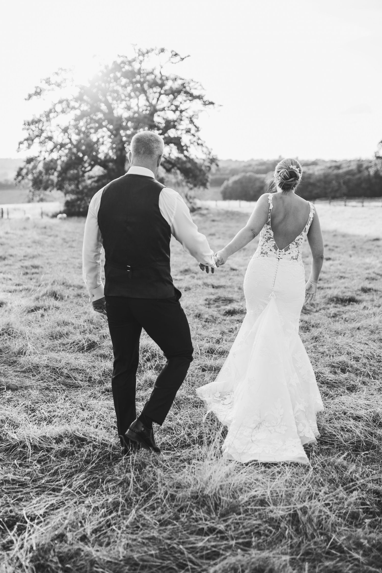 Beautiful wedding at Gaynes Park, Essex, featuring rustic barns, stunning gardens, and romantic outdoor photography in a picturesque setting