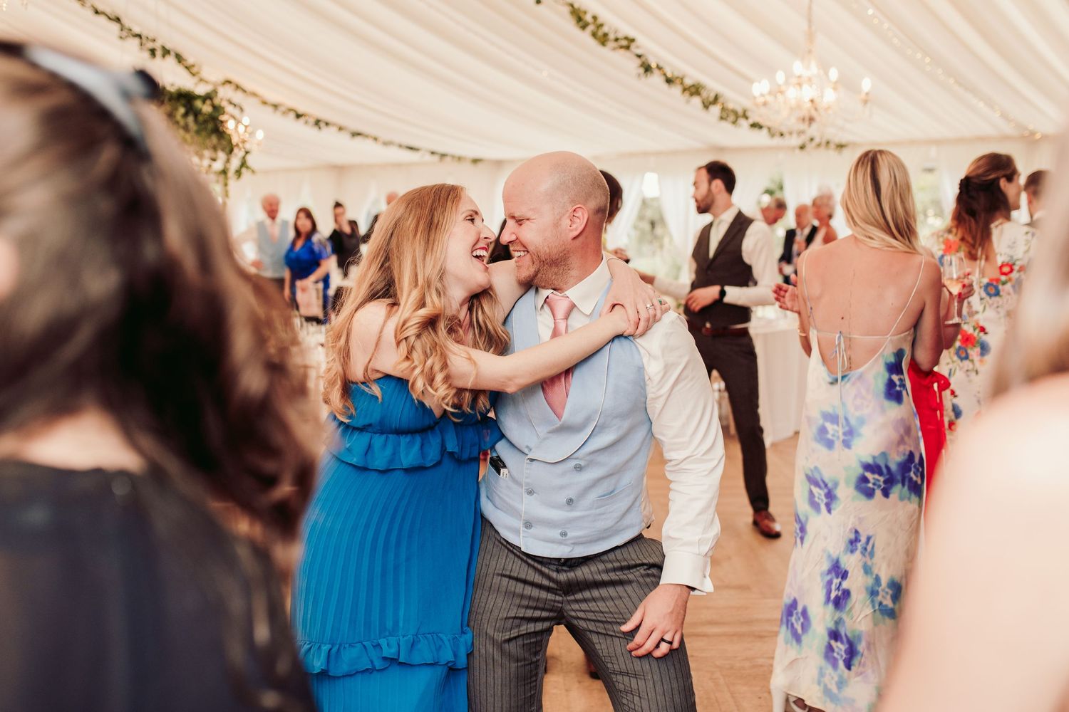 Glemham Hall Wedding Venue in Suffolk Countrysid Exchange Vows in Glemham Hall's Great HallTable Setup in Marquee with Pastel Flowers