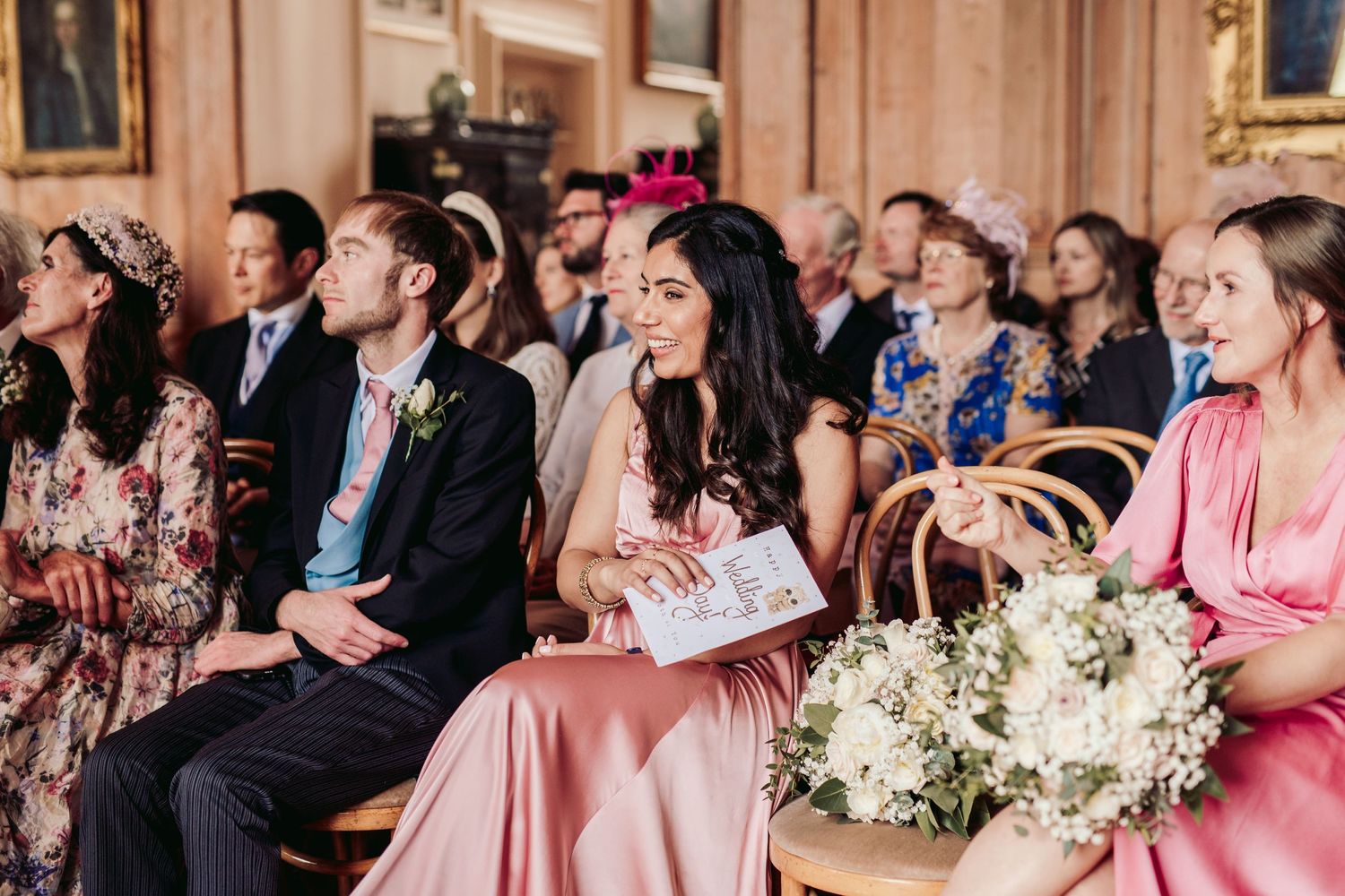 Glemham Hall Wedding Venue in Suffolk Countrysid Exchange Vows in Glemham Hall's Great HallTable Setup in Marquee with Pastel Flowers