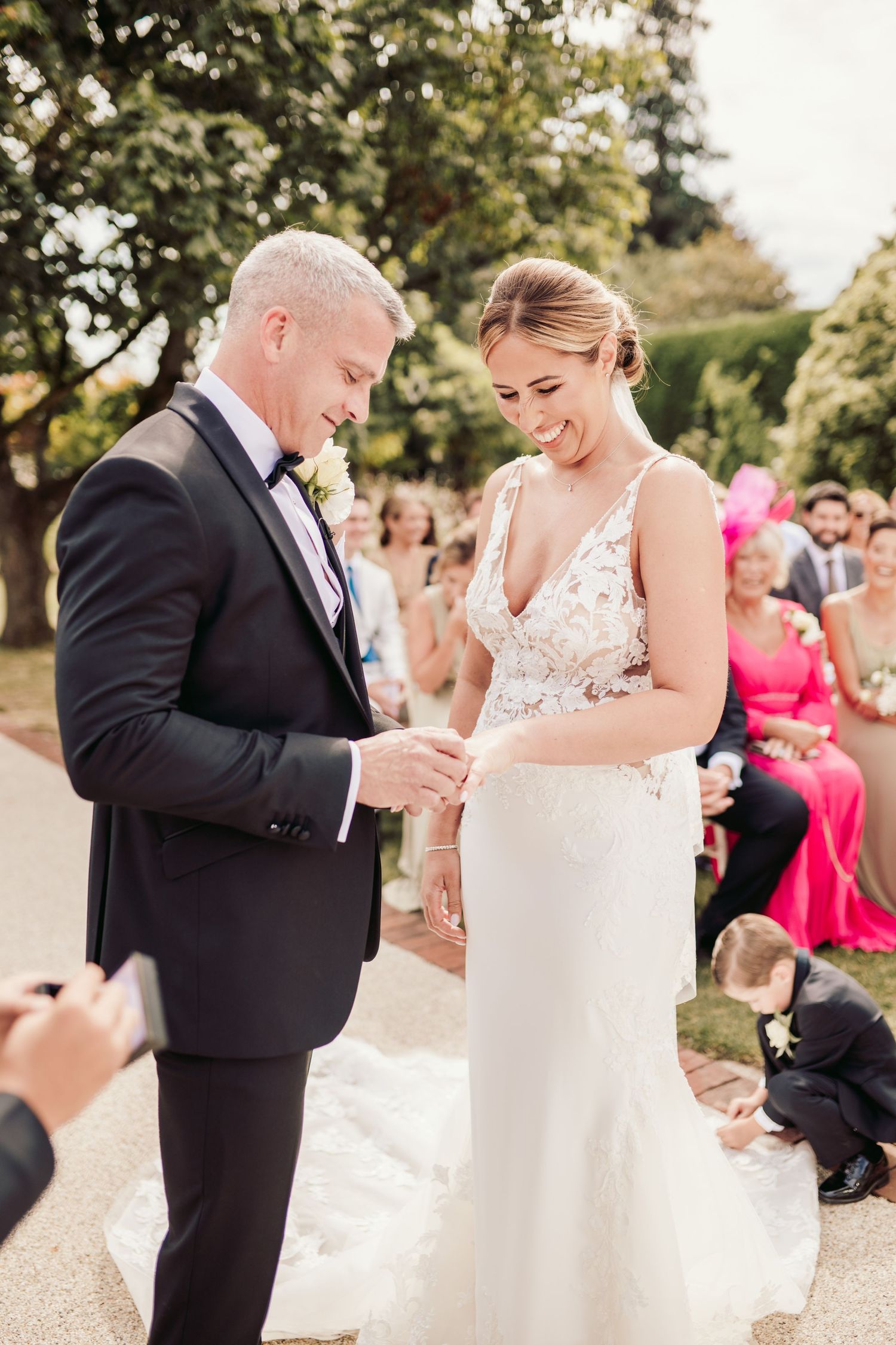 Beautiful wedding at Gaynes Park, Essex, featuring rustic barns, stunning gardens, and romantic outdoor photography in a picturesque setting