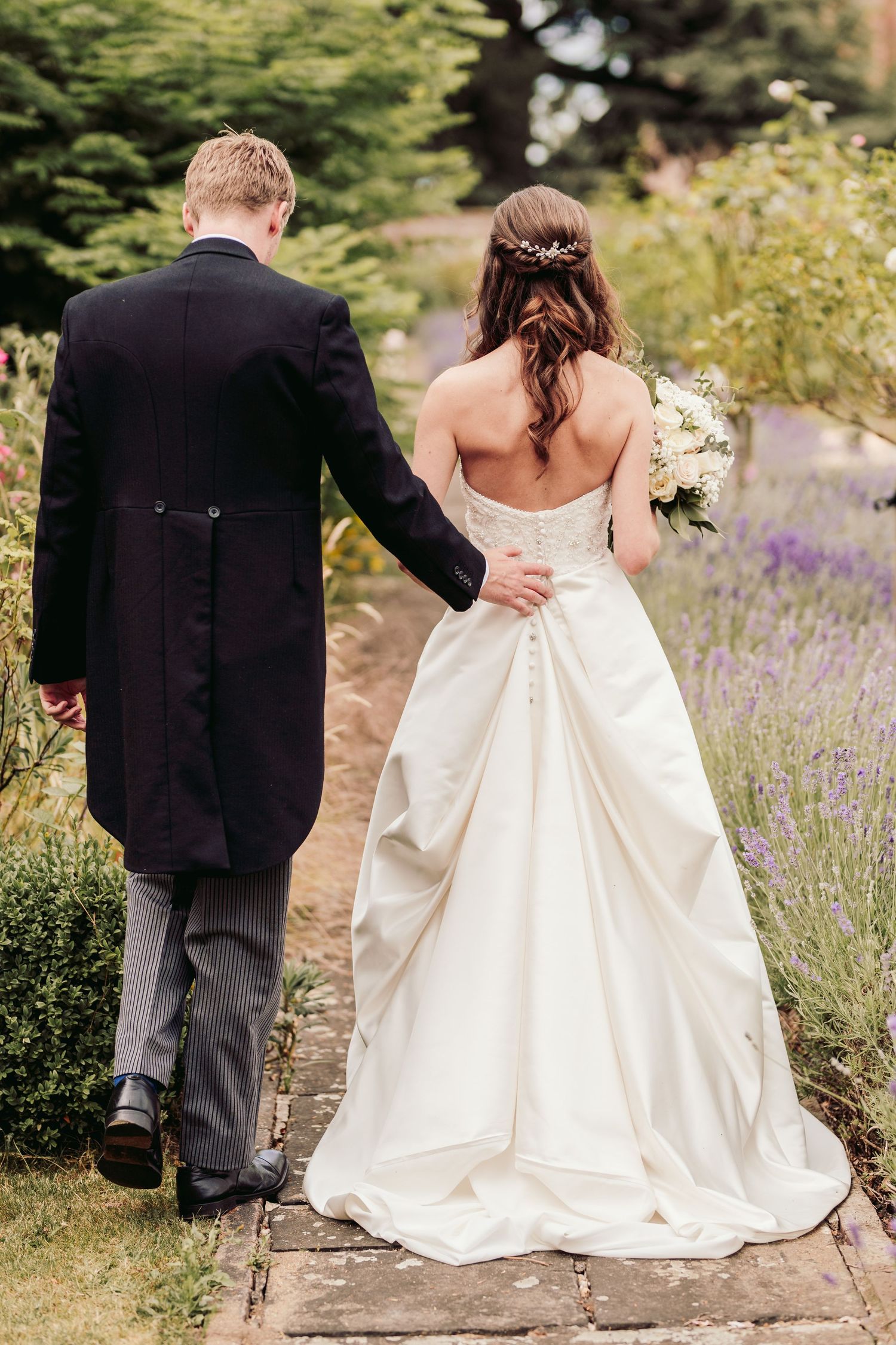 Glemham Hall Wedding Venue in Suffolk Countrysid Exchange Vows in Glemham Hall's Great HallTable Setup in Marquee with Pastel Flowers