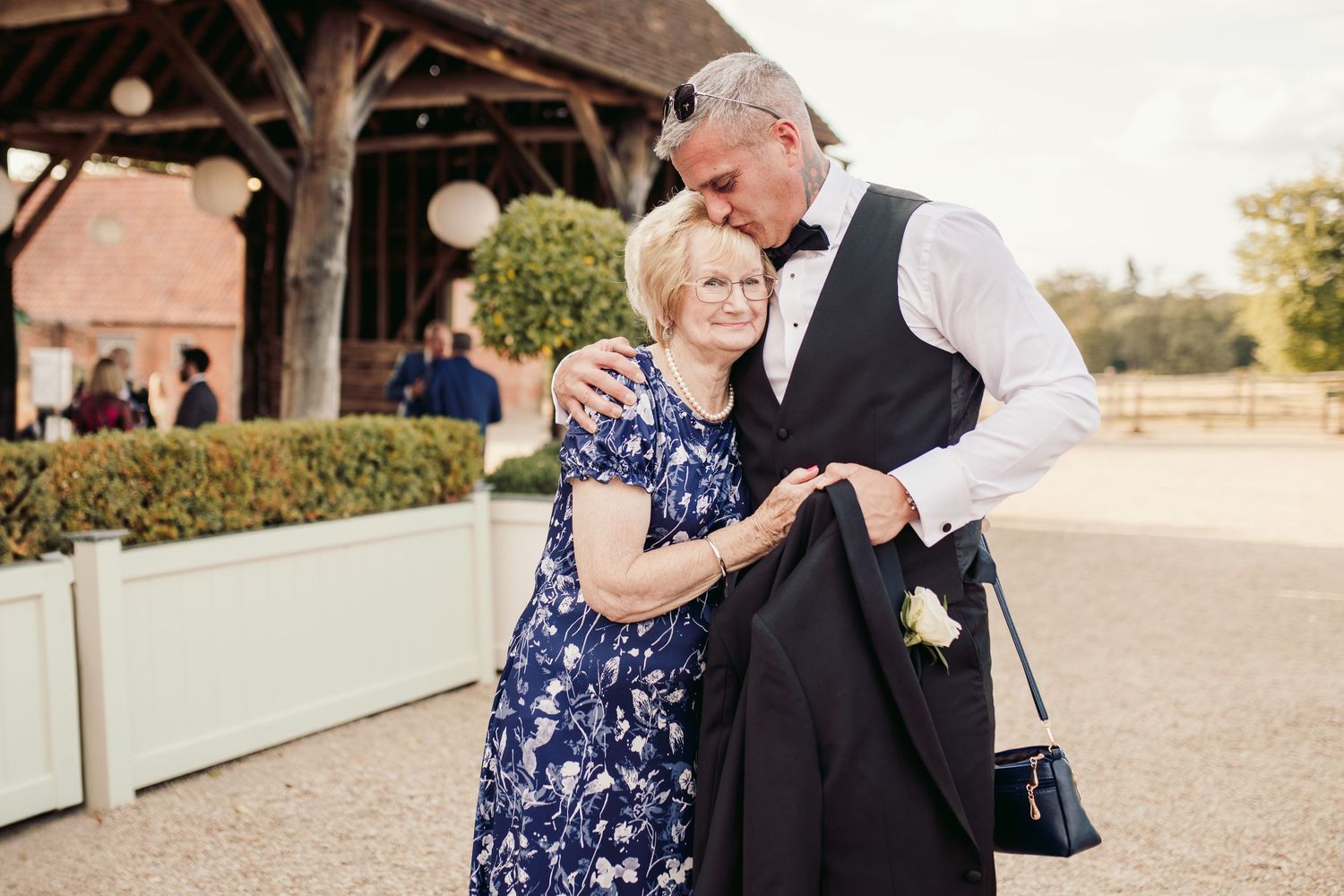 Beautiful wedding at Gaynes Park, Essex, featuring rustic barns, stunning gardens, and romantic outdoor photography in a picturesque setting