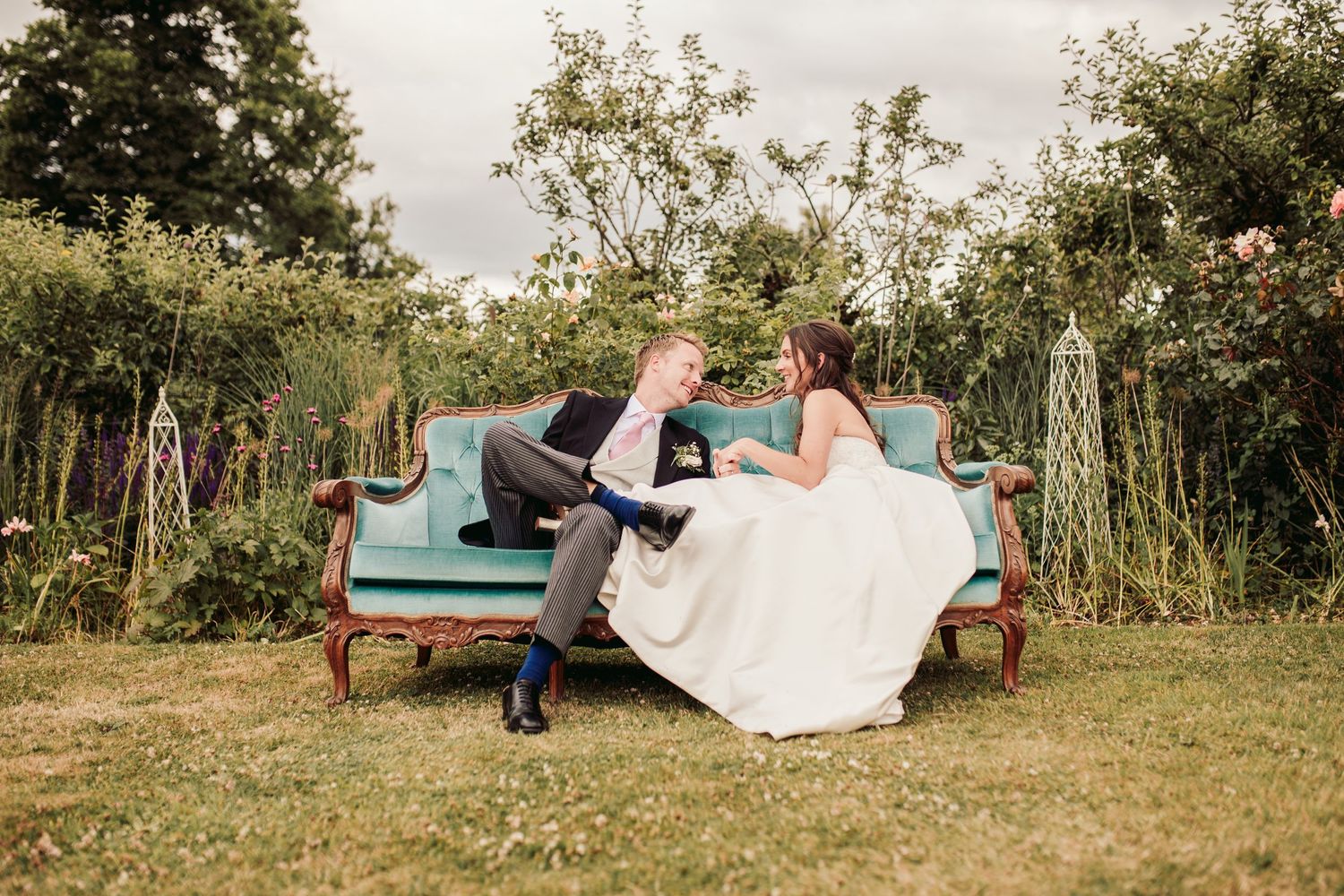 Glemham Hall Wedding Venue in Suffolk Countrysid Exchange Vows in Glemham Hall's Great HallTable Setup in Marquee with Pastel Flowers