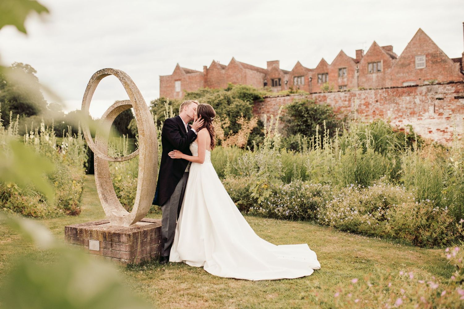 Glemham Hall Wedding Venue in Suffolk Countrysid Exchange Vows in Glemham Hall's Great HallTable Setup in Marquee with Pastel Flowers