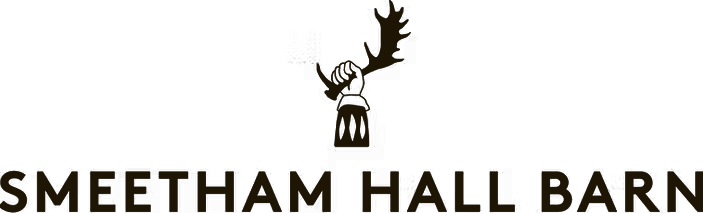 Smeetham Hall Barn logo featuring a deer head with antlers in black silhouette design.