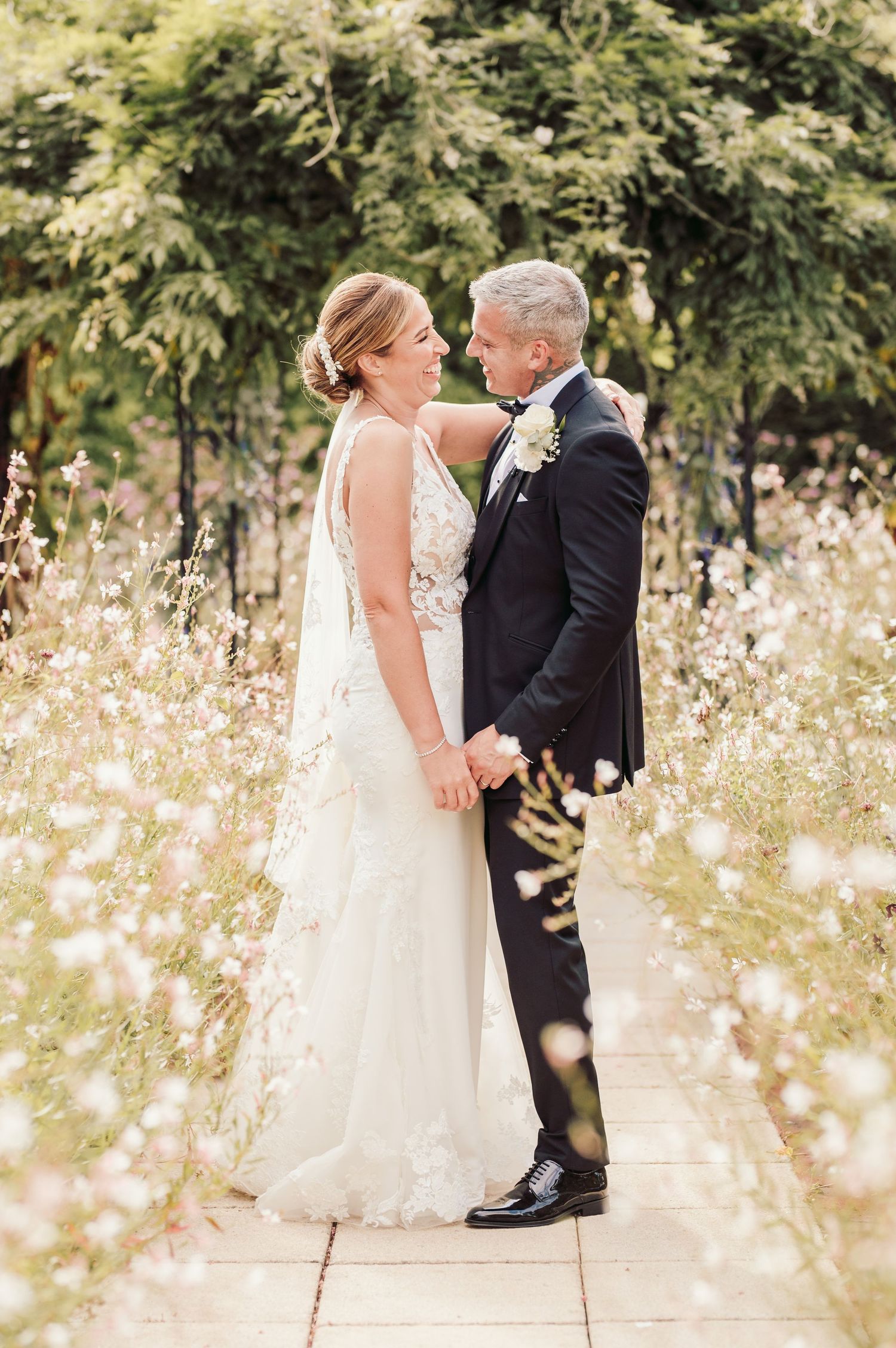 Beautiful wedding at Gaynes Park, Essex, featuring rustic barns, stunning gardens, and romantic outdoor photography in a picturesque setting