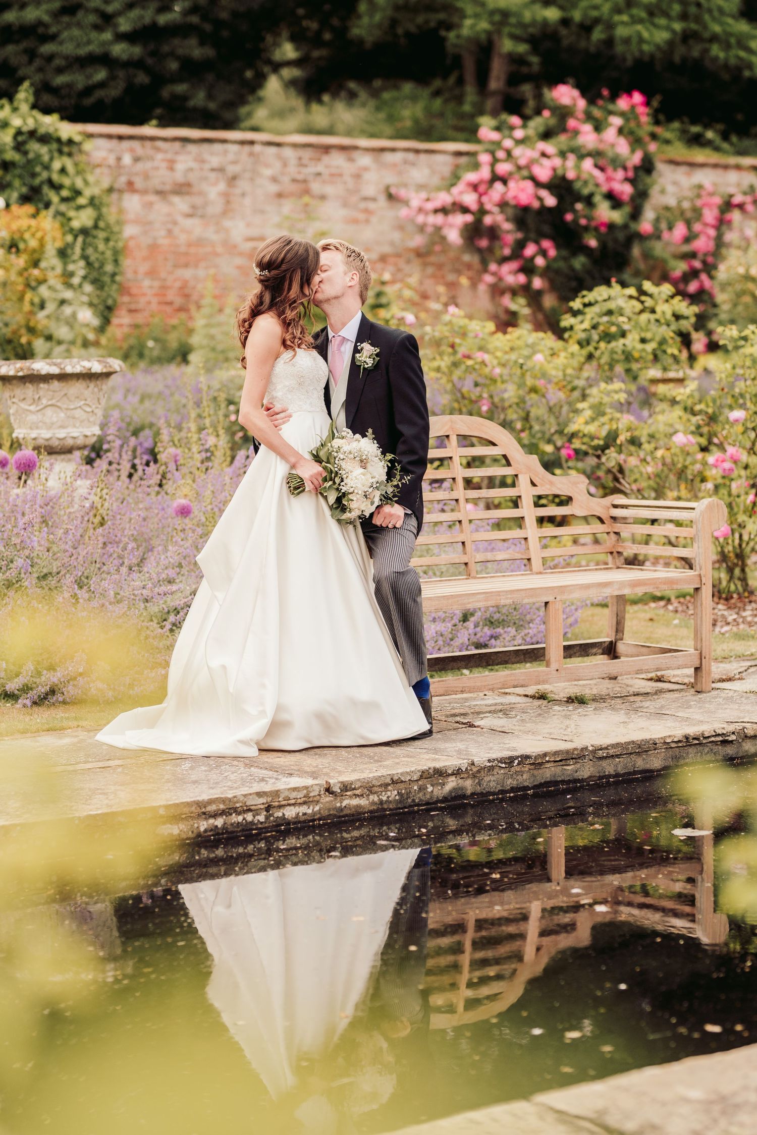 Glemham Hall Wedding Venue in Suffolk Countrysid Exchange Vows in Glemham Hall's Great HallTable Setup in Marquee with Pastel Flowers