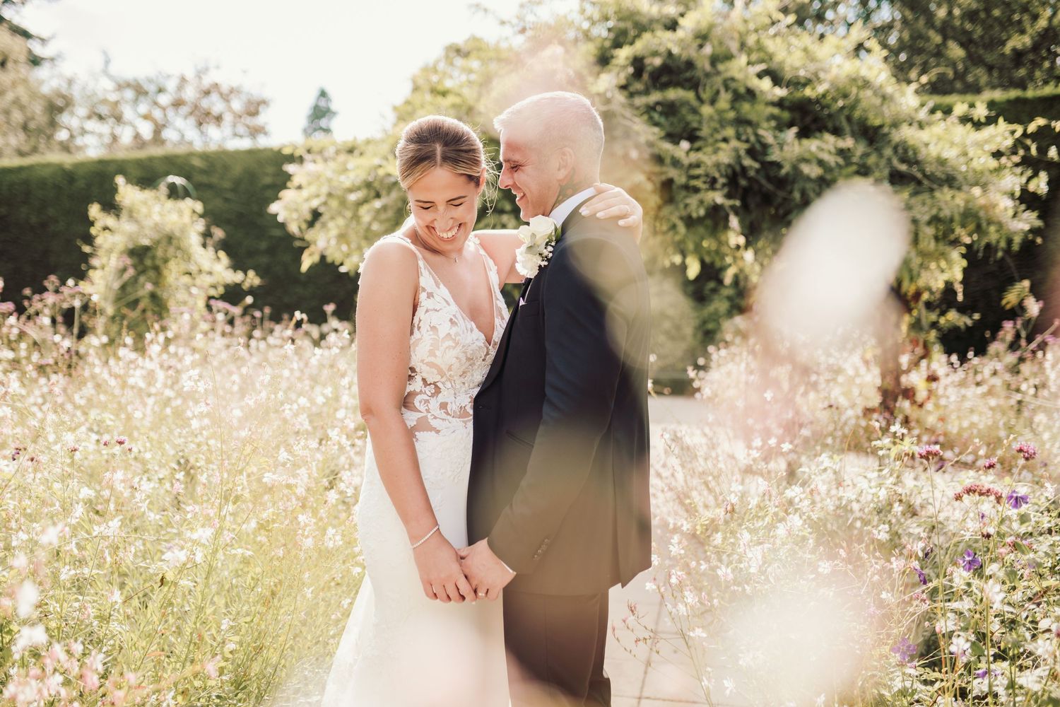 Beautiful wedding at Gaynes Park, Essex, featuring rustic barns, stunning gardens, and romantic outdoor photography in a picturesque setting
