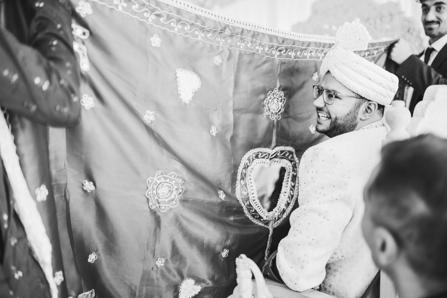 Elegant Ethiopian wedding celebration with traditional cultural decorations in black and white photography.
